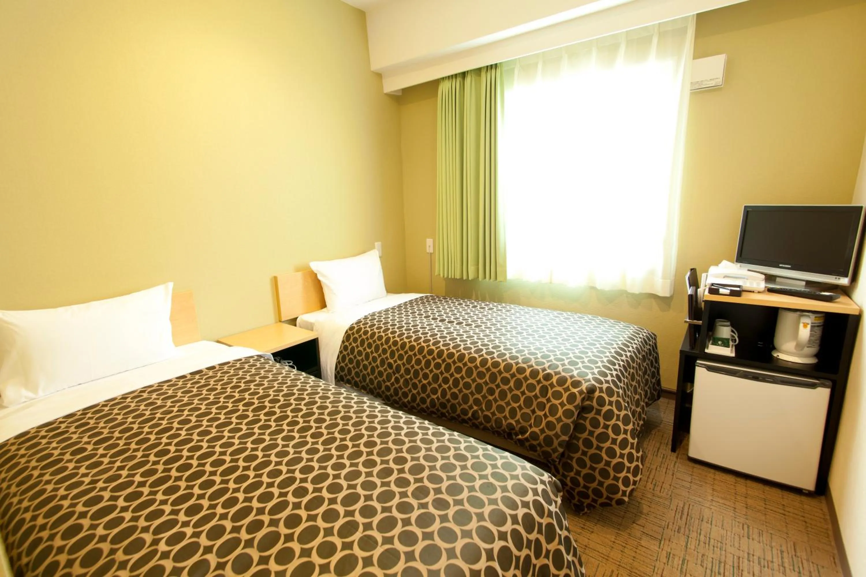 Photo of the whole room, Bed in Community & Spa Naha Central Hotel