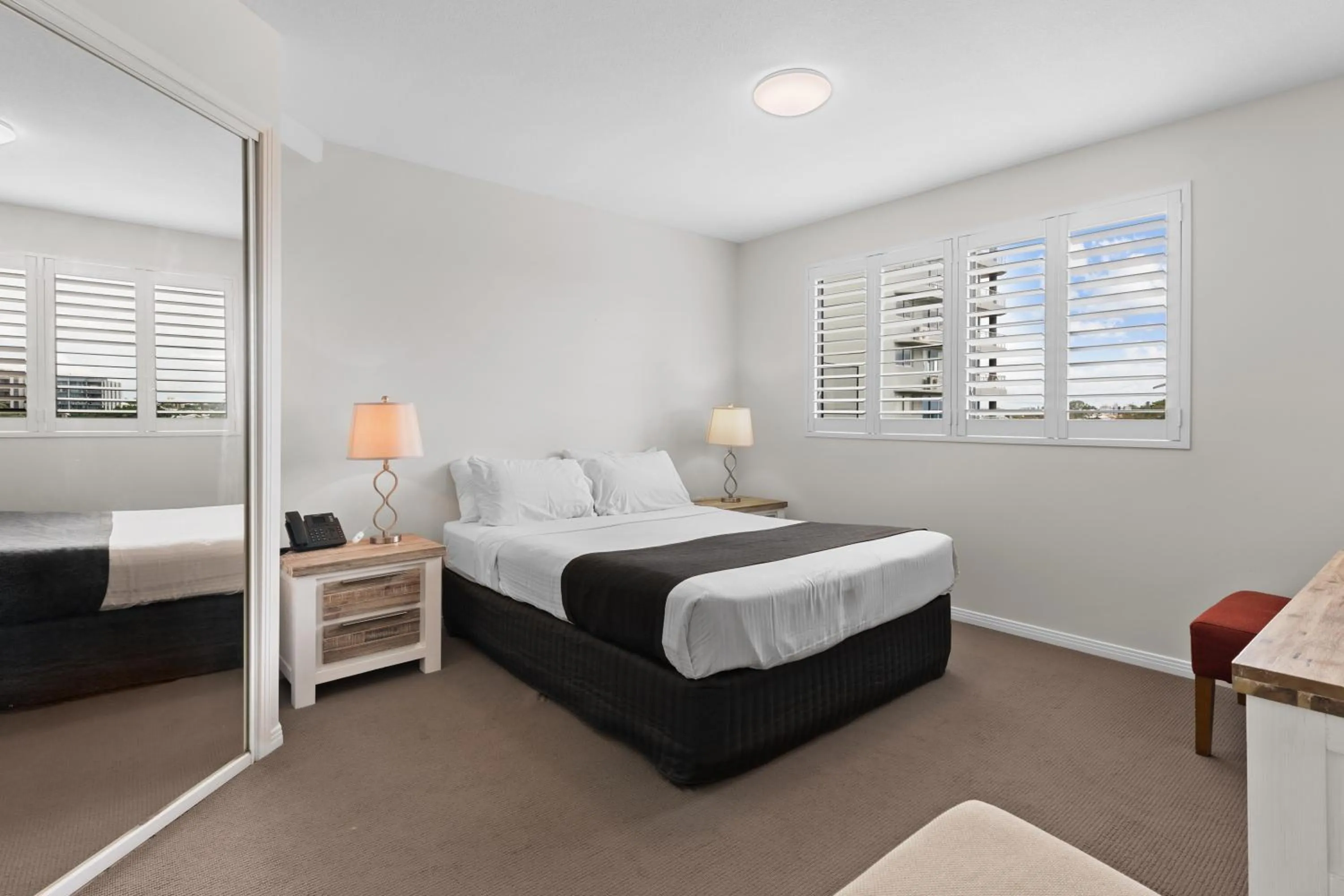 Bedroom, Bed in The Oasis Apartments