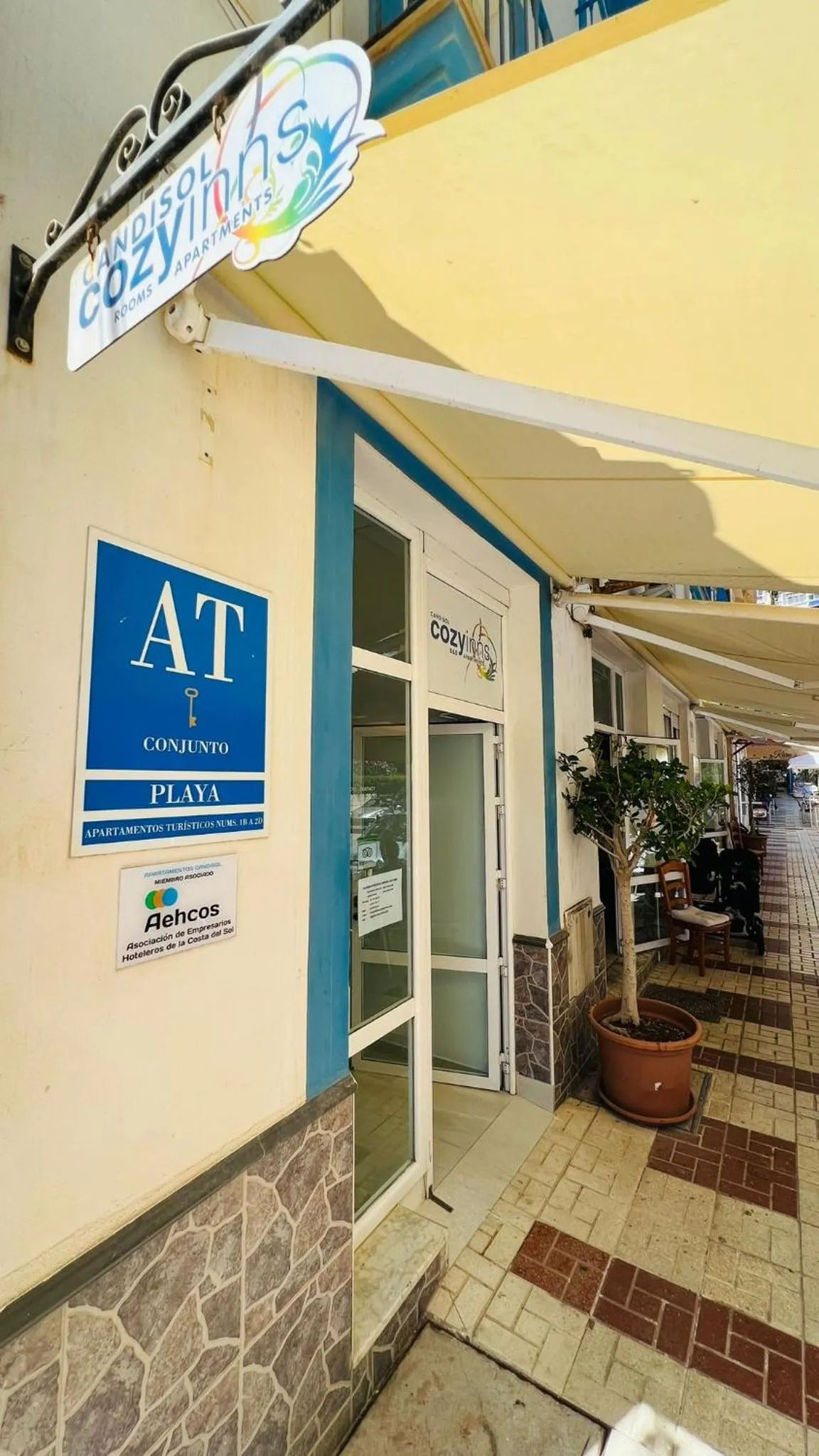 Property logo or sign in Candisol Cozy Inns