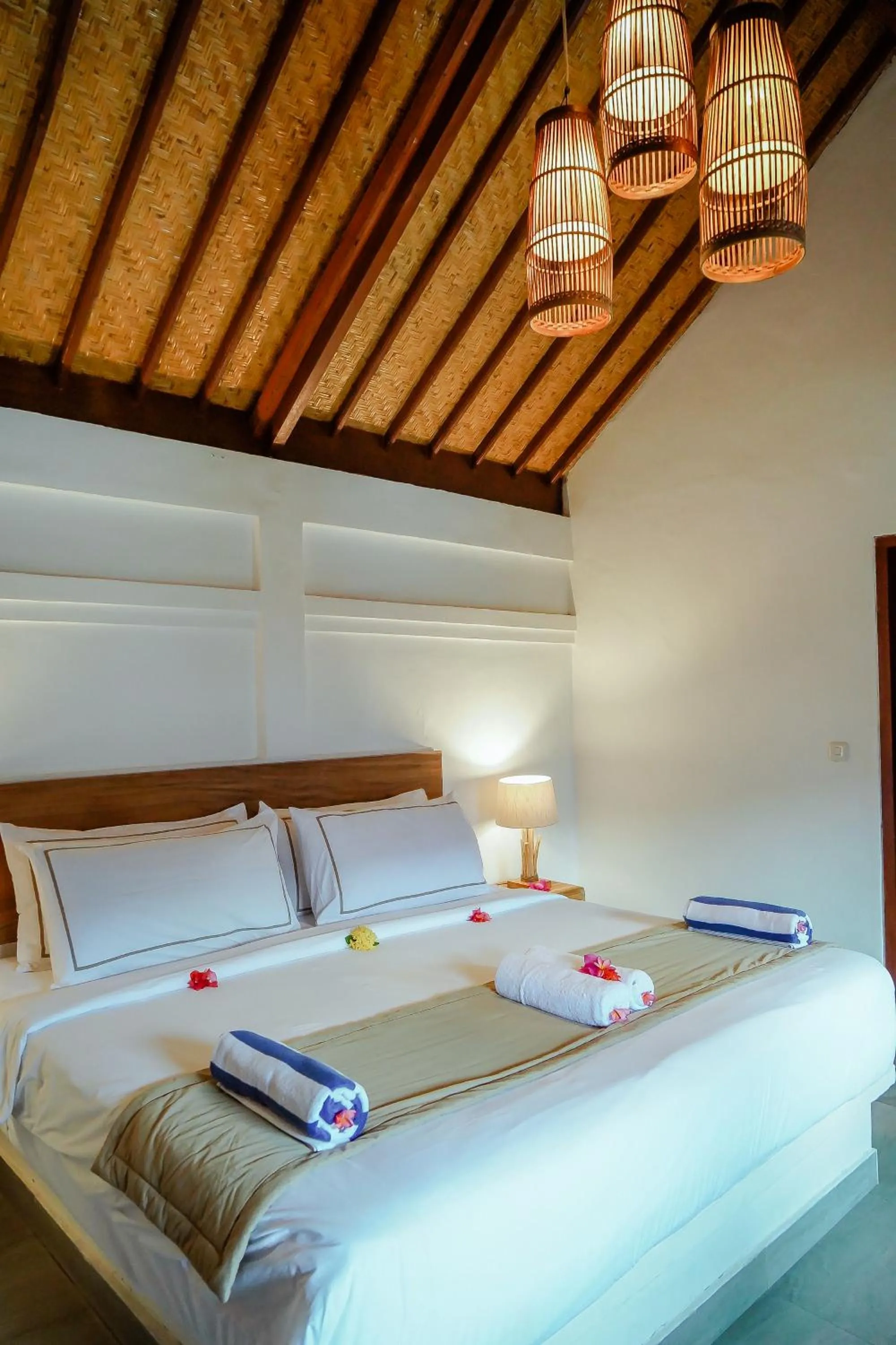 towels, Bed in Marygio Gili Resort