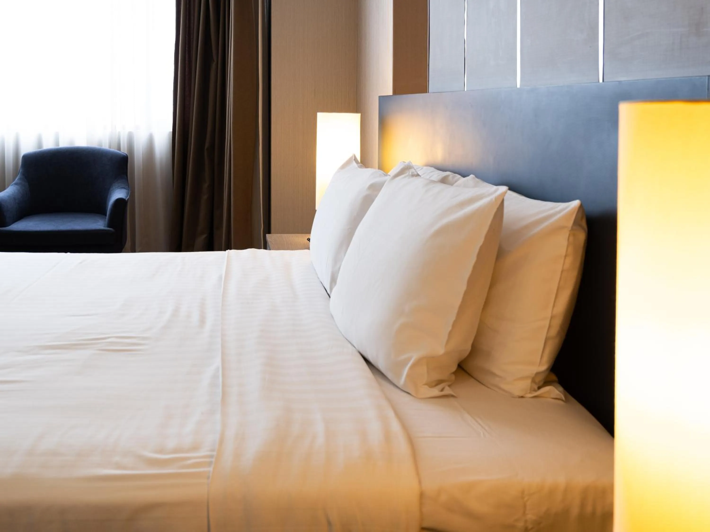 Bed in Rembrandt Residences Bangkok