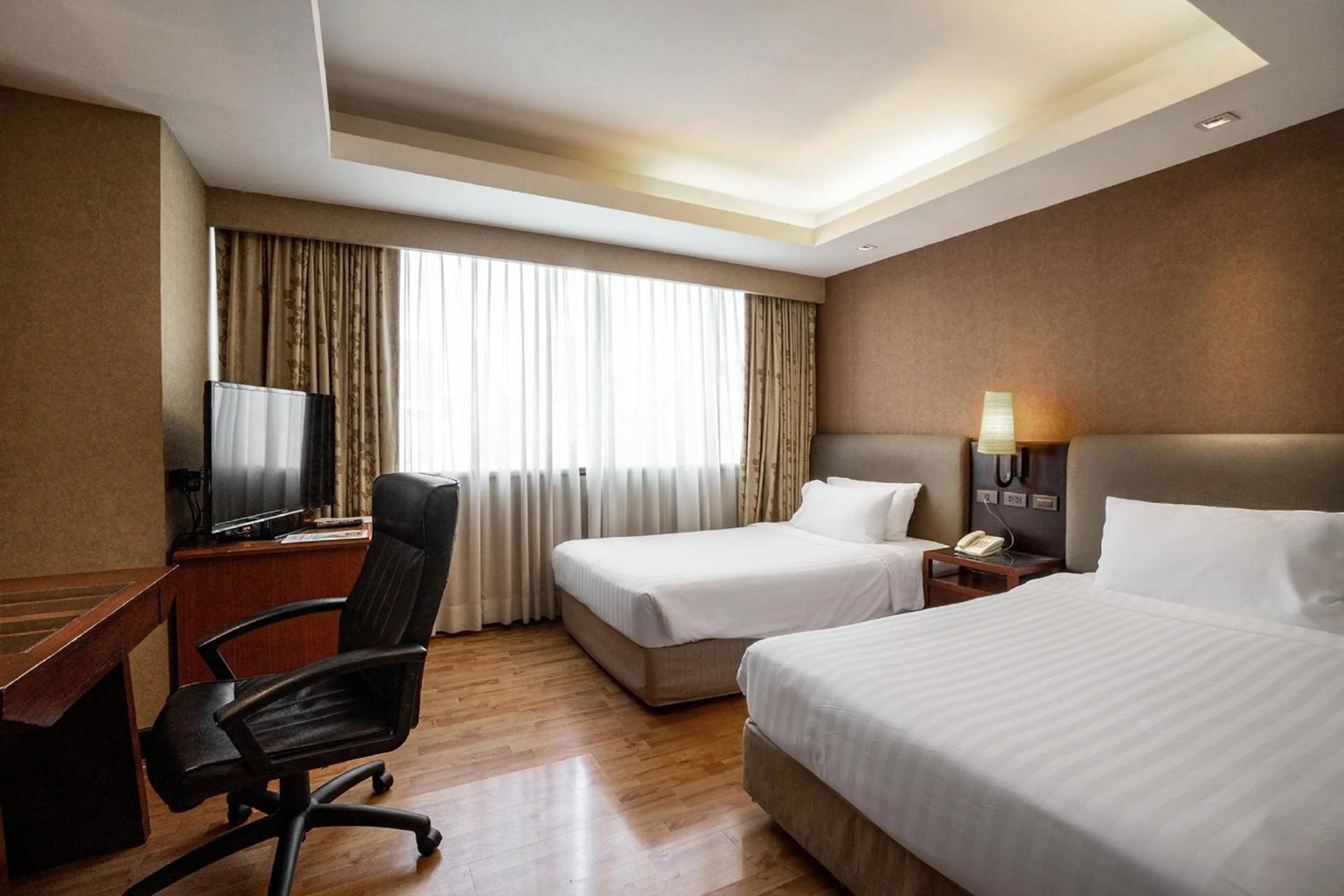 Bed in Rembrandt Residences Bangkok