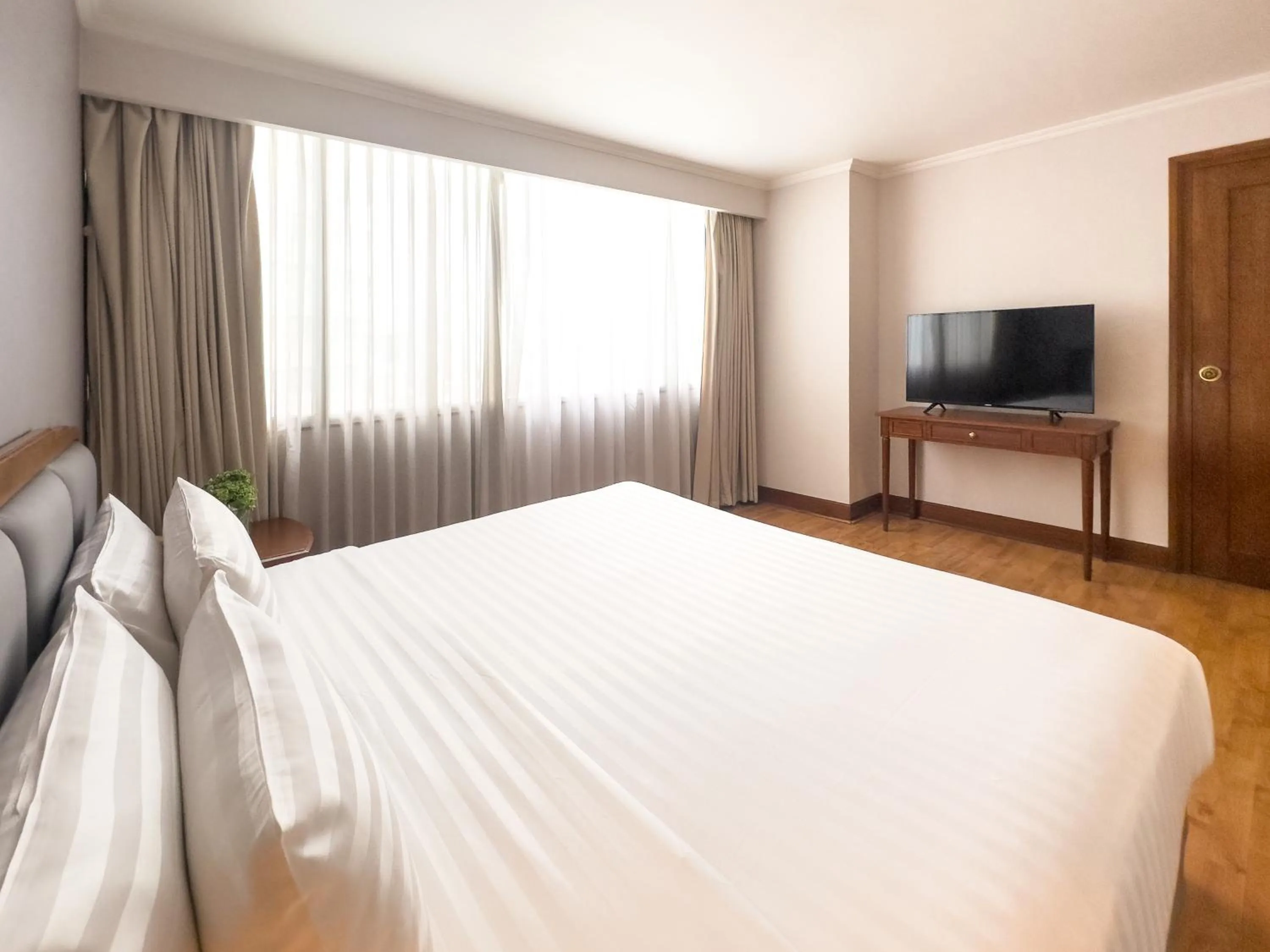 Bed in Rembrandt Residences Bangkok