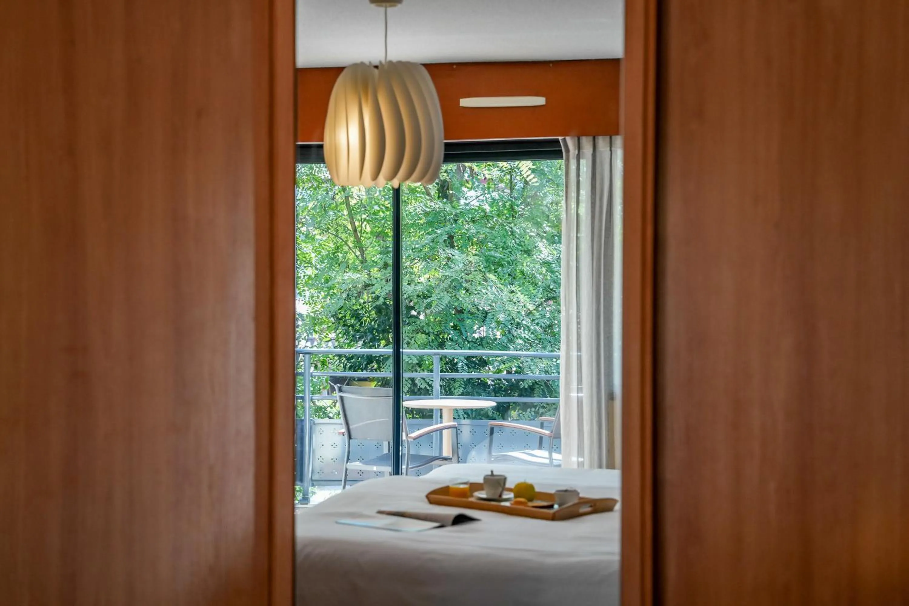 Bed in Hotel Le Pavillon Bleu