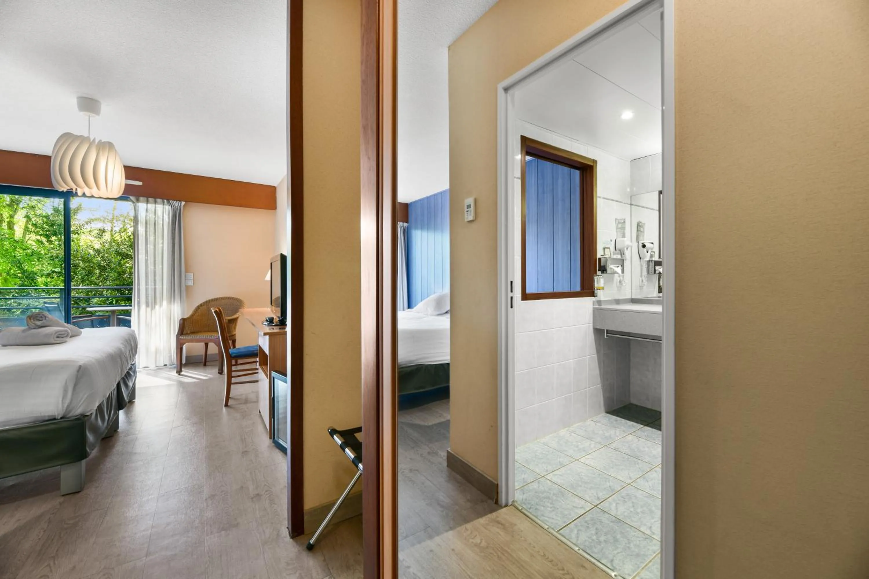 Photo of the whole room, Bed in Hotel Le Pavillon Bleu