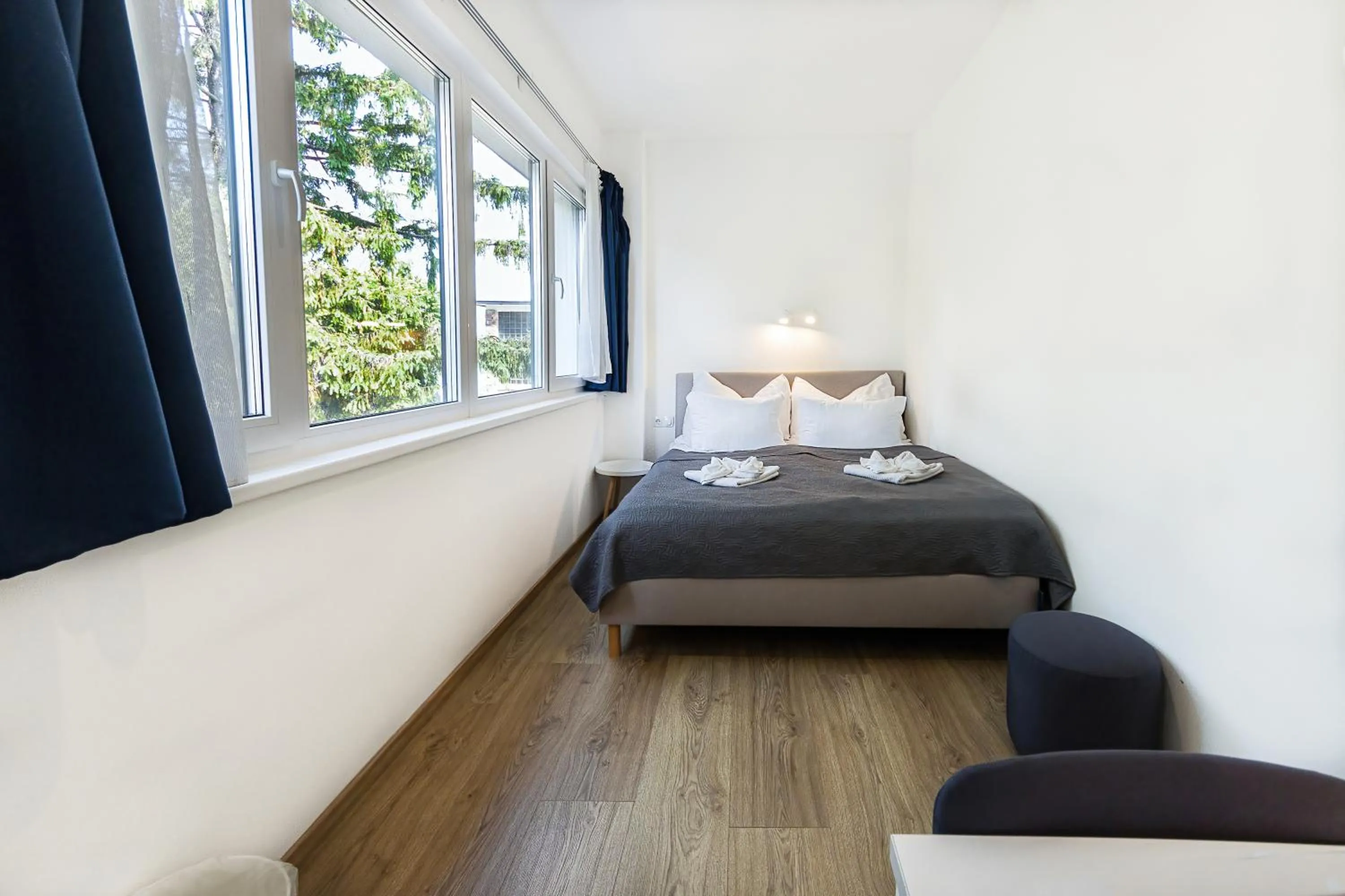 Bed in PLAGE-ON Panzió