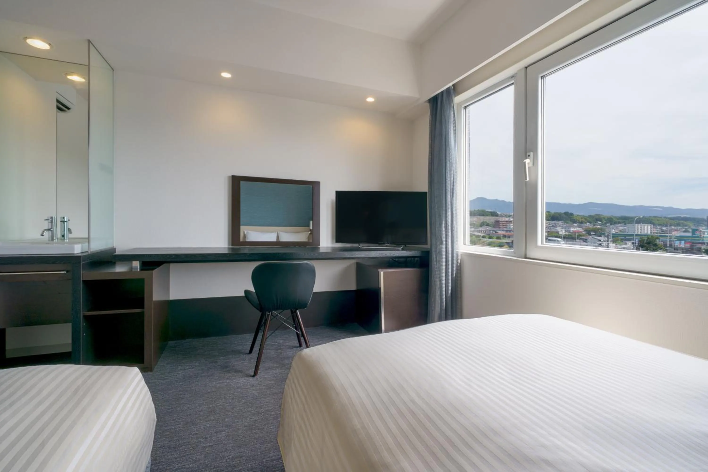 Photo of the whole room, Bed in Hotel Vista Kumamoto Airport