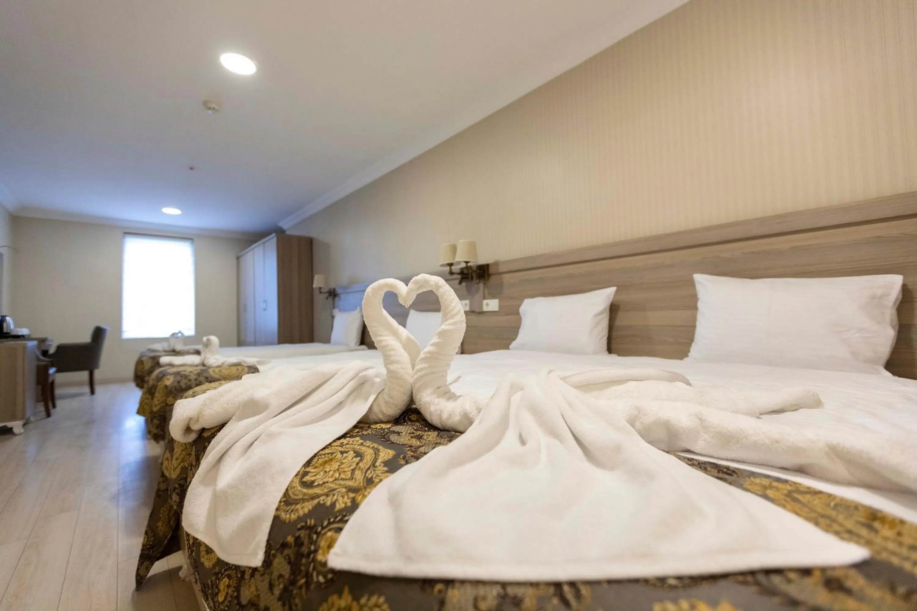 Bed in World Point Hotel Besyol