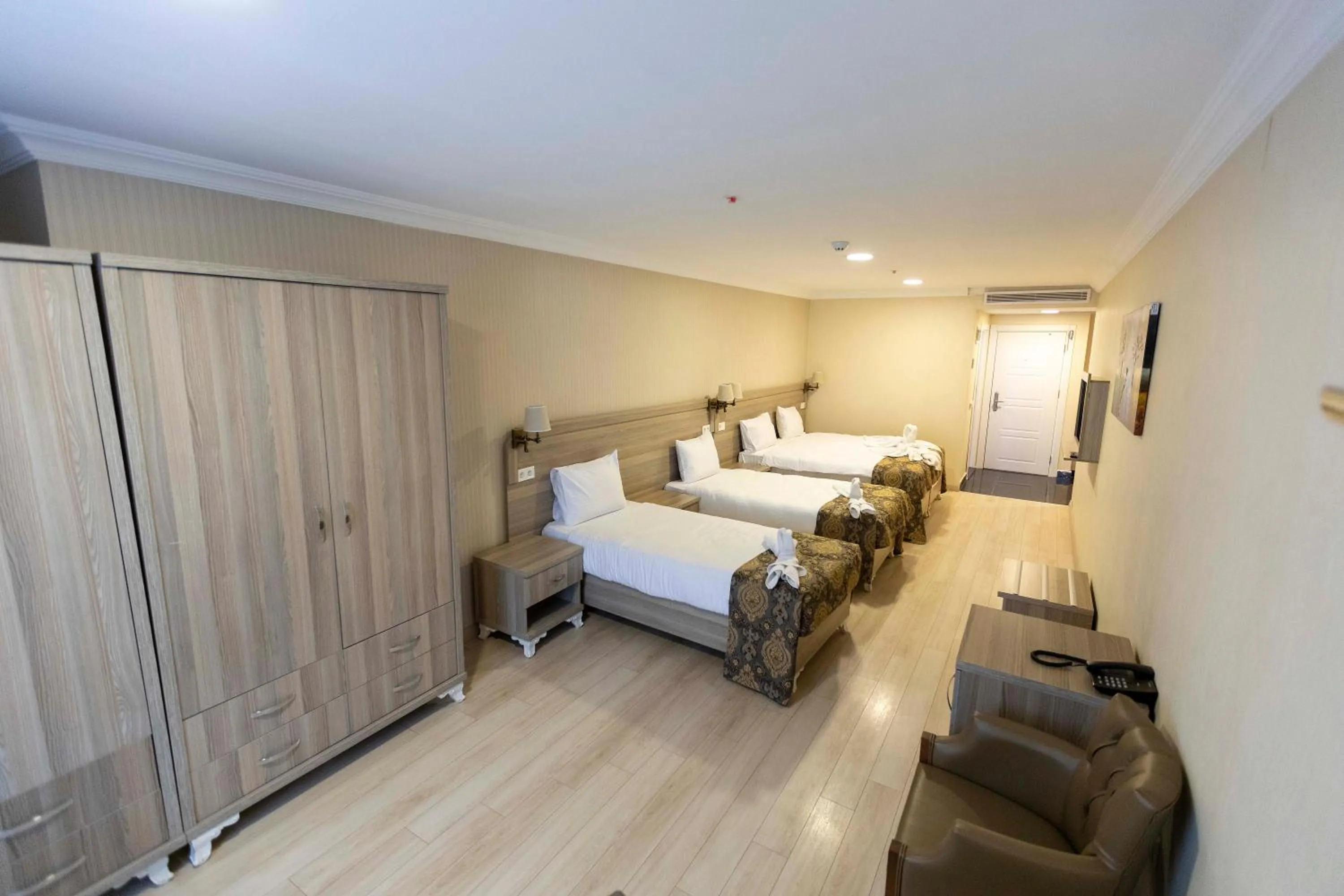 Bed in World Point Hotel Besyol