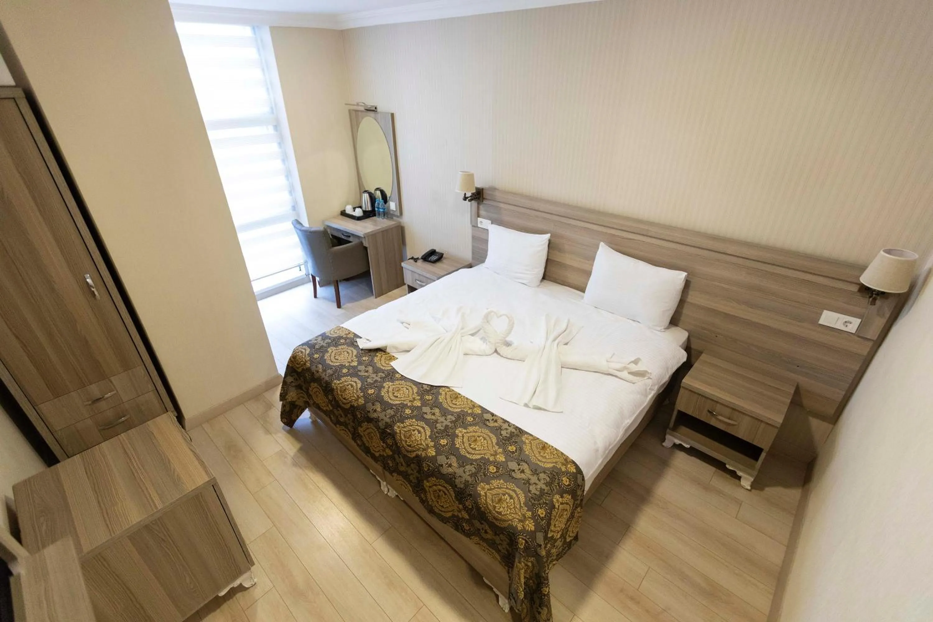 Photo of the whole room, Bed in World Point Hotel Besyol