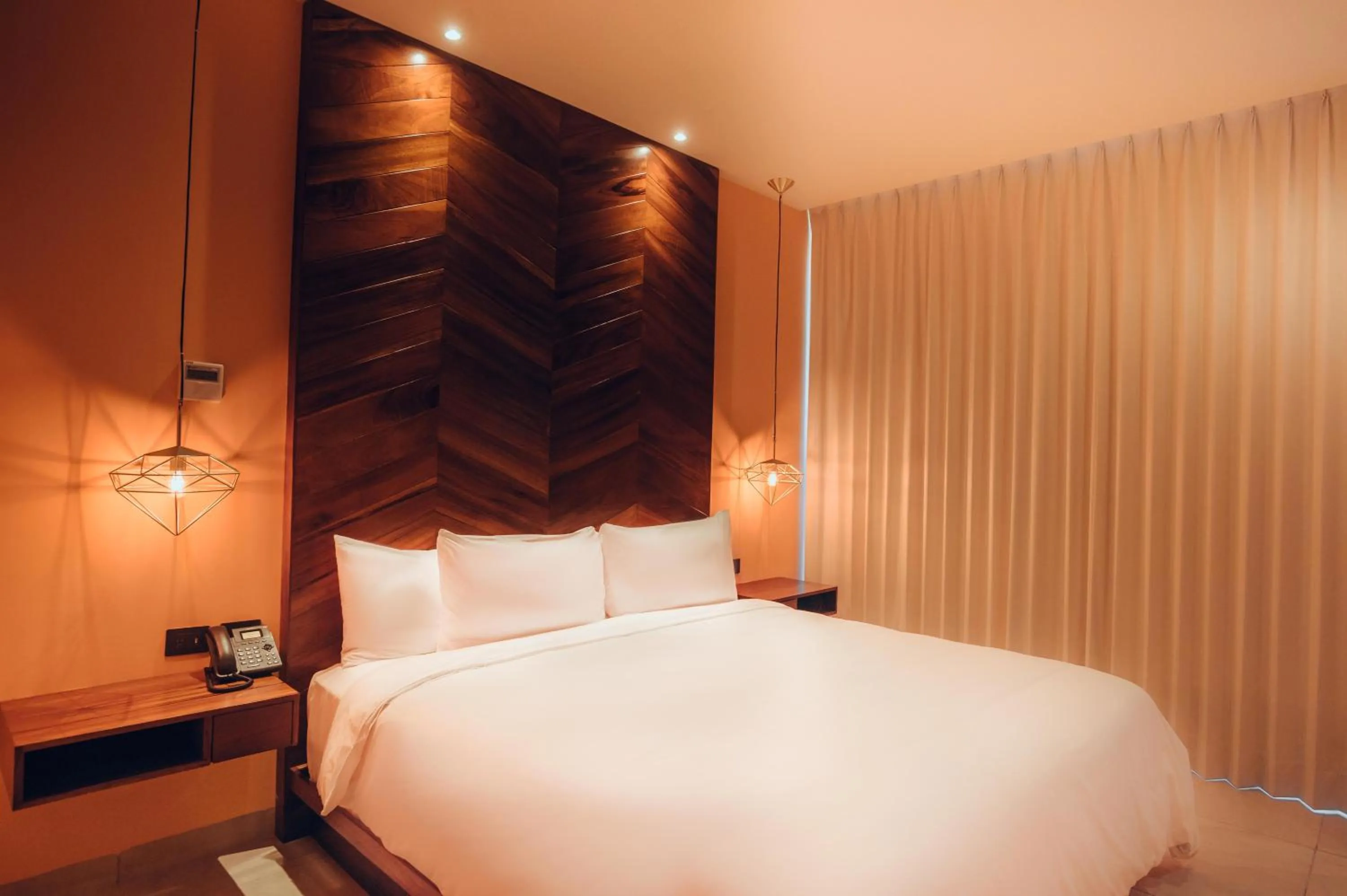 Bed in CALIXTA Hotel