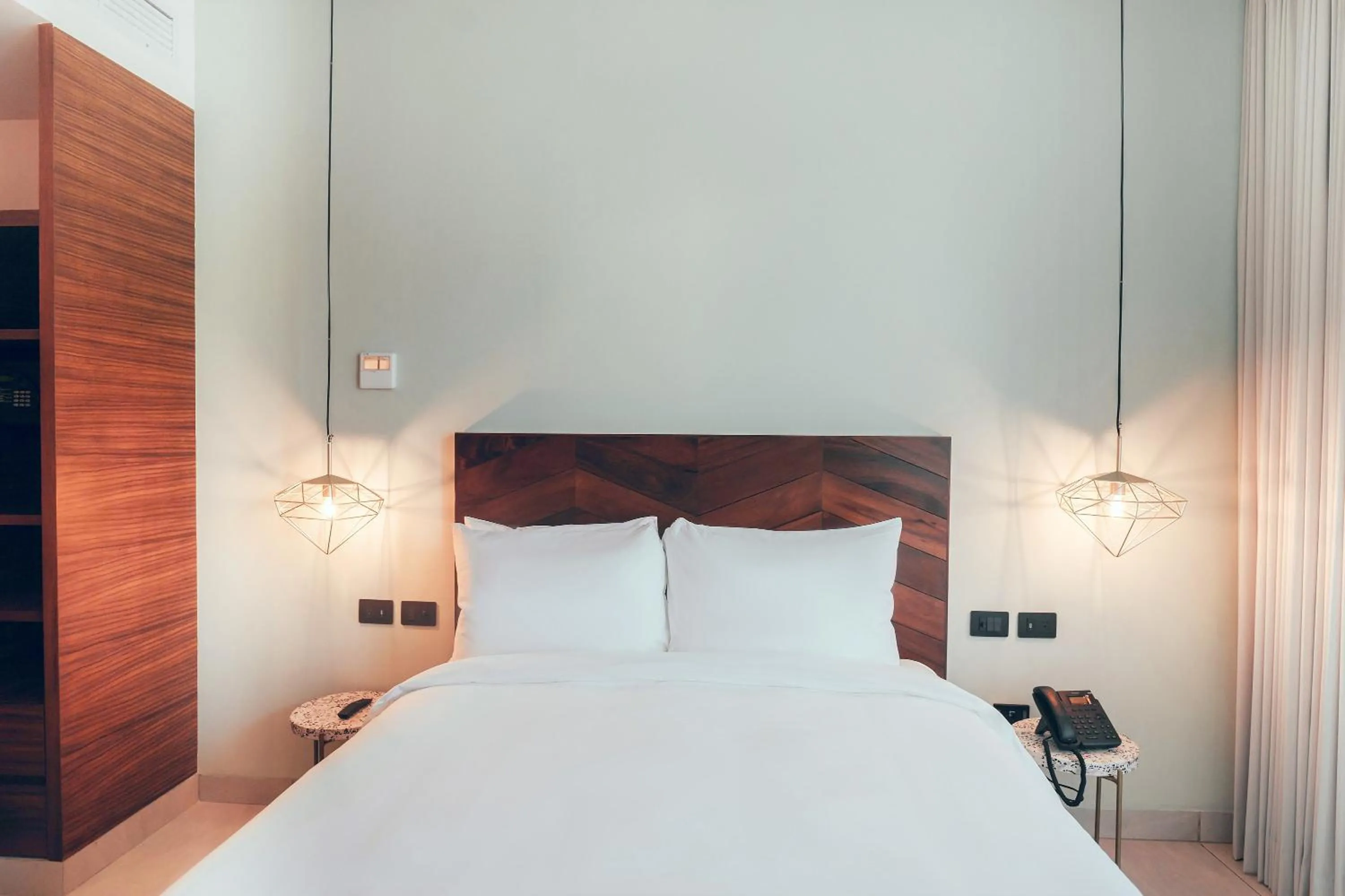 Bed in CALIXTA Hotel