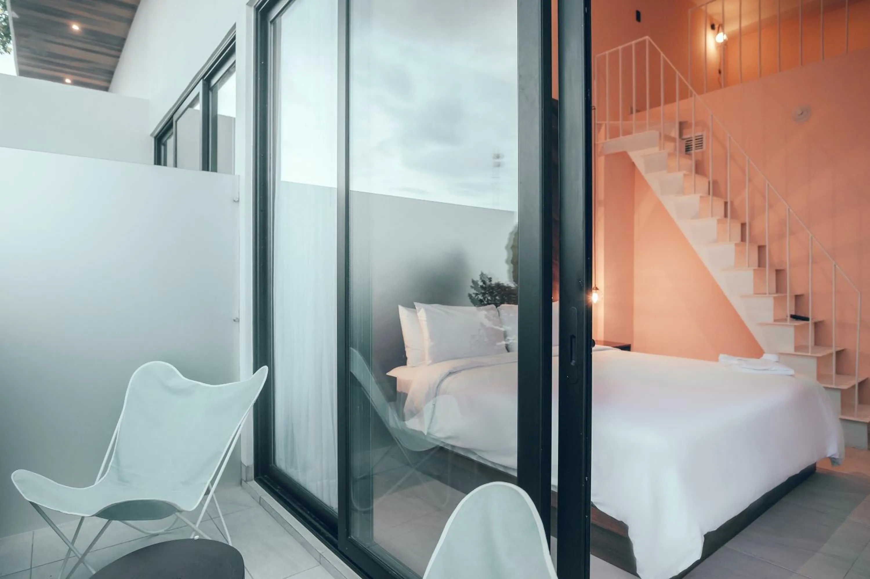 Balcony/Terrace, Bed in CALIXTA Hotel