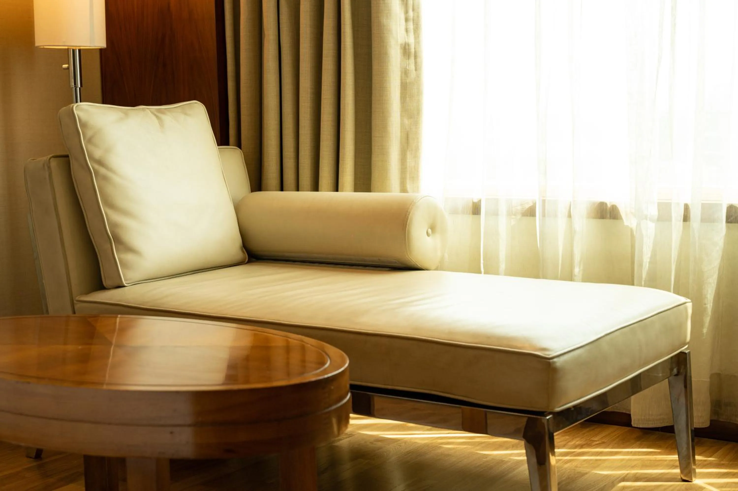 Seating area, Bed in DoubleTree by Hilton-Pune Chinchwad