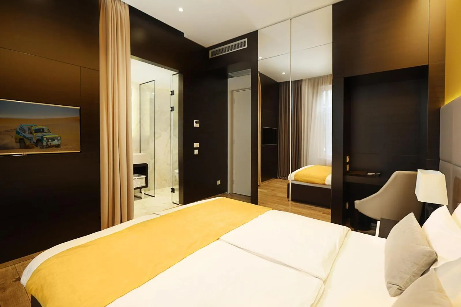 Bed in Maccani Black Luxury Suites