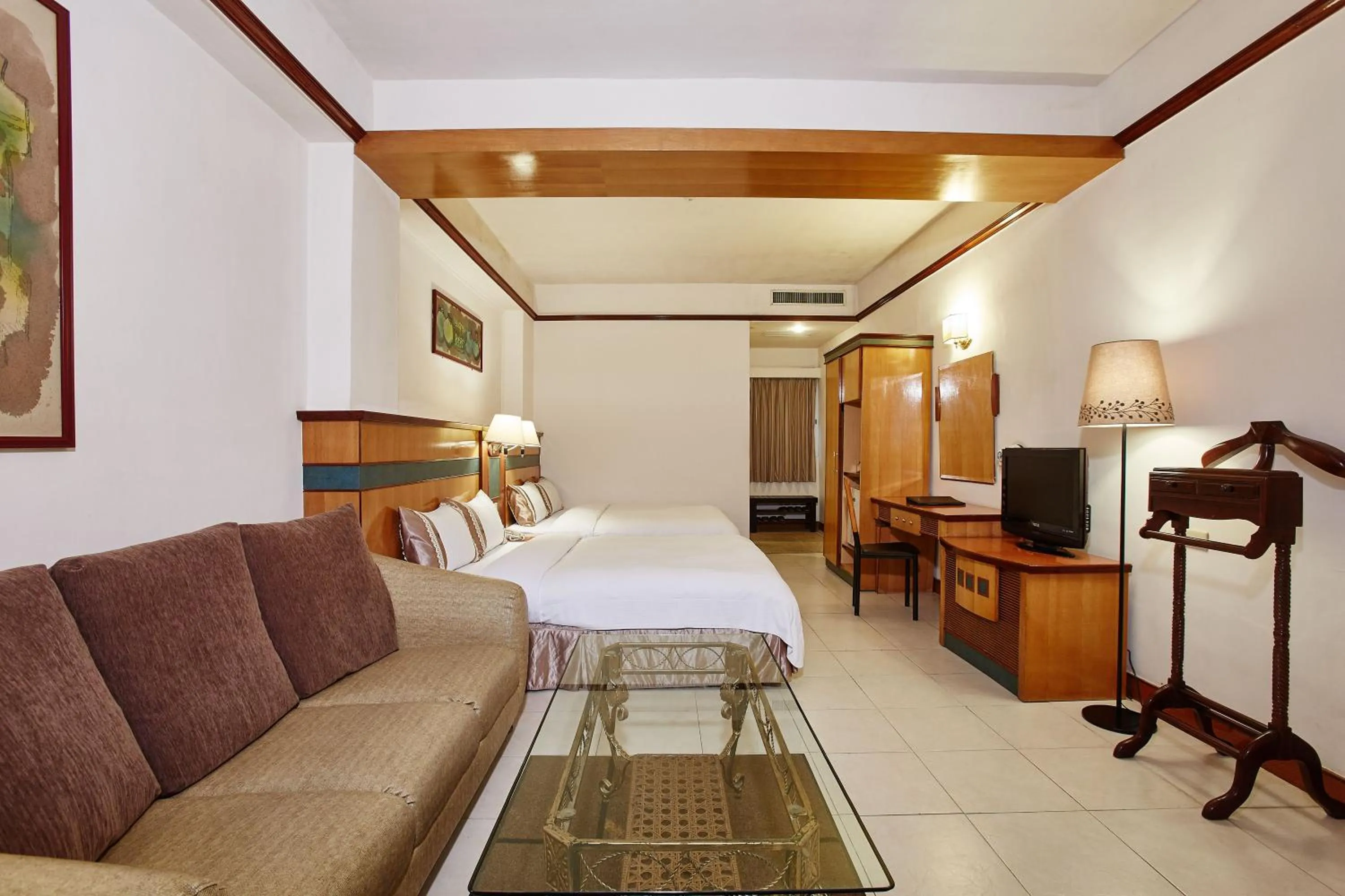 Bed in Rainbow Resort Hotel