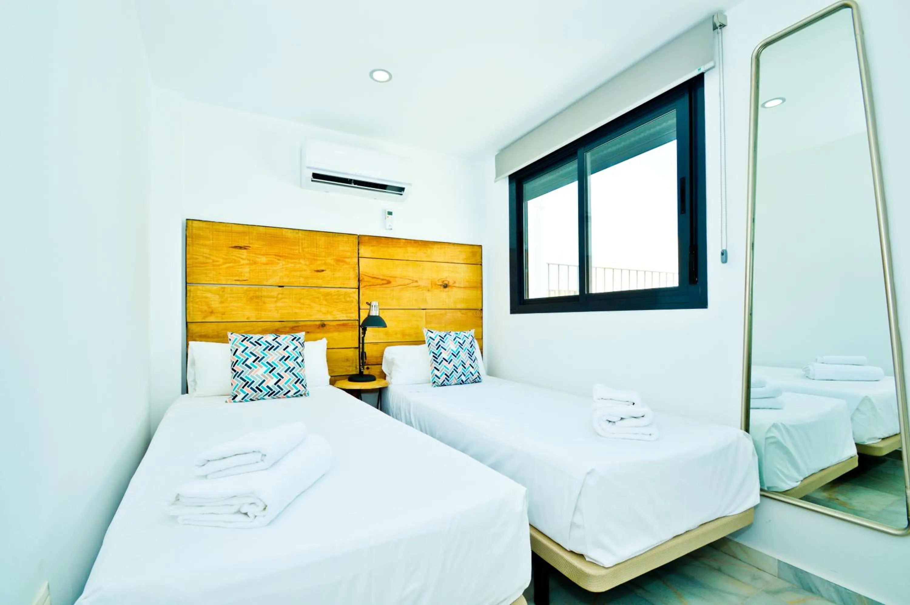 Bed in The Zentral Suites & Apartments