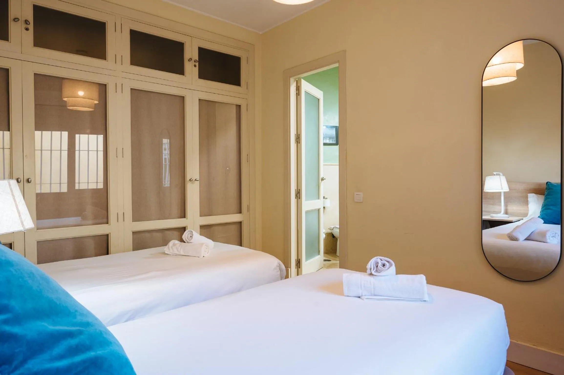 Bed in The Zentral Suites & Apartments