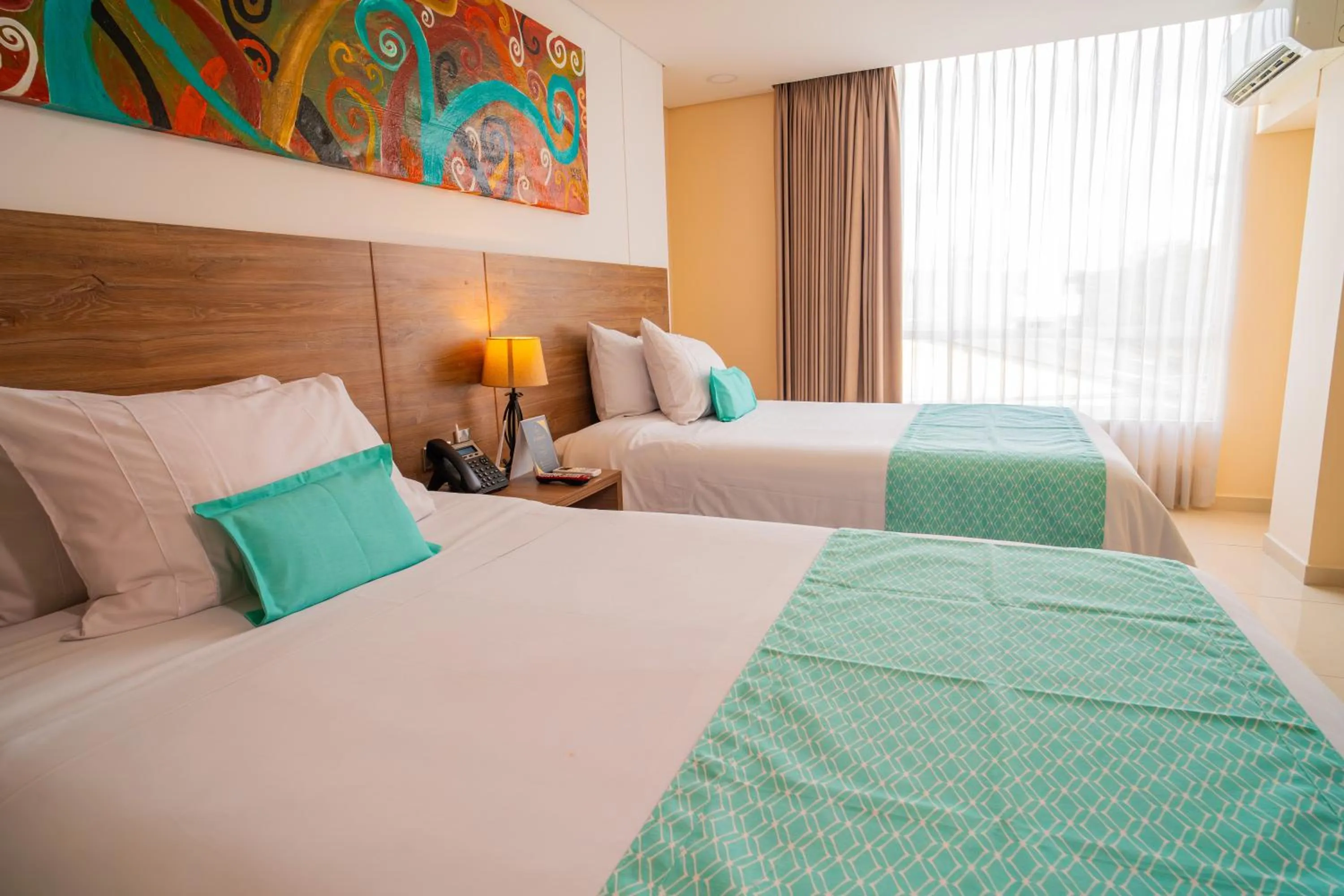 Bed in Ambar Hotel Boutique Cali