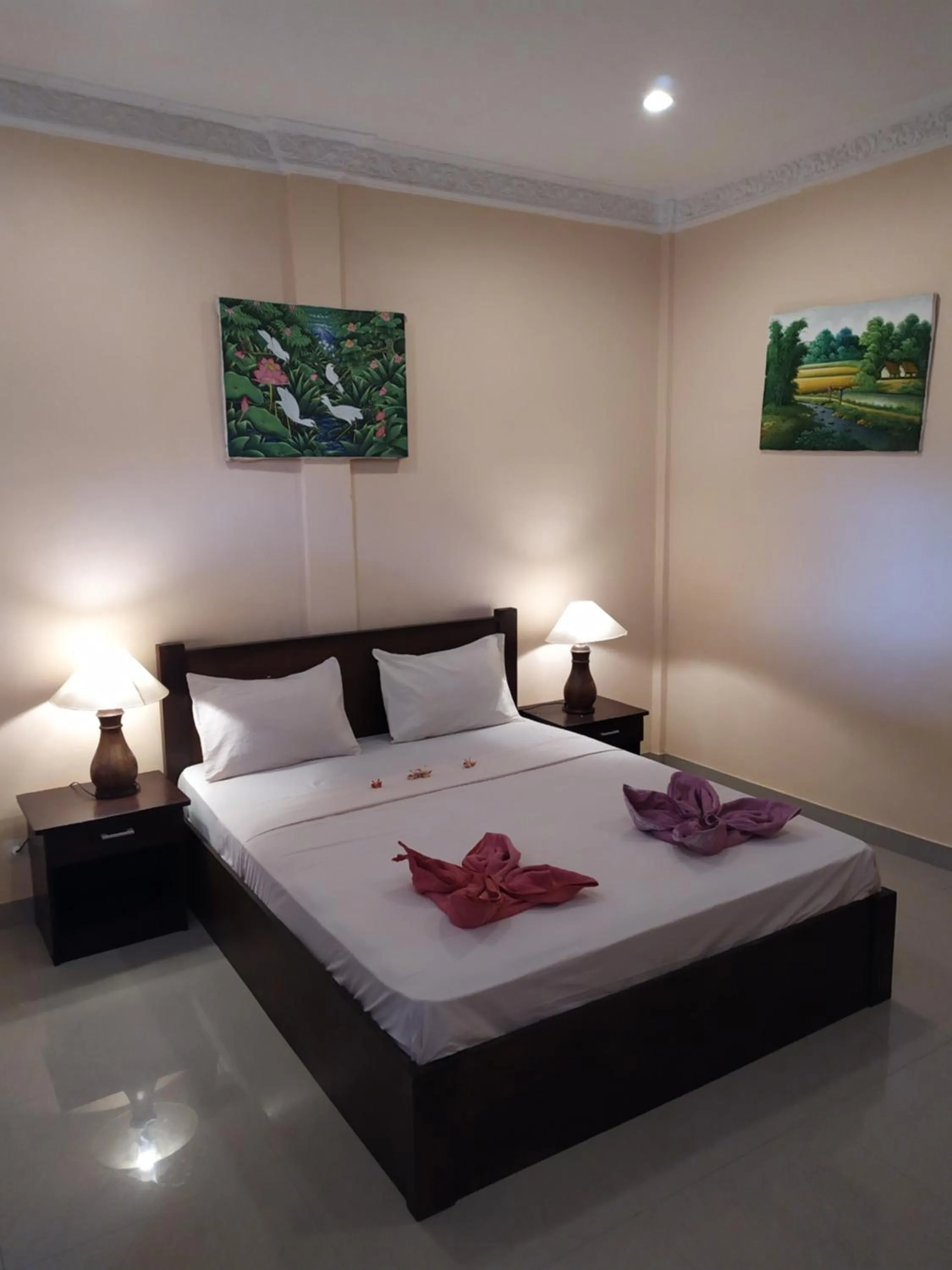 Bed in Kusuka Bungalow