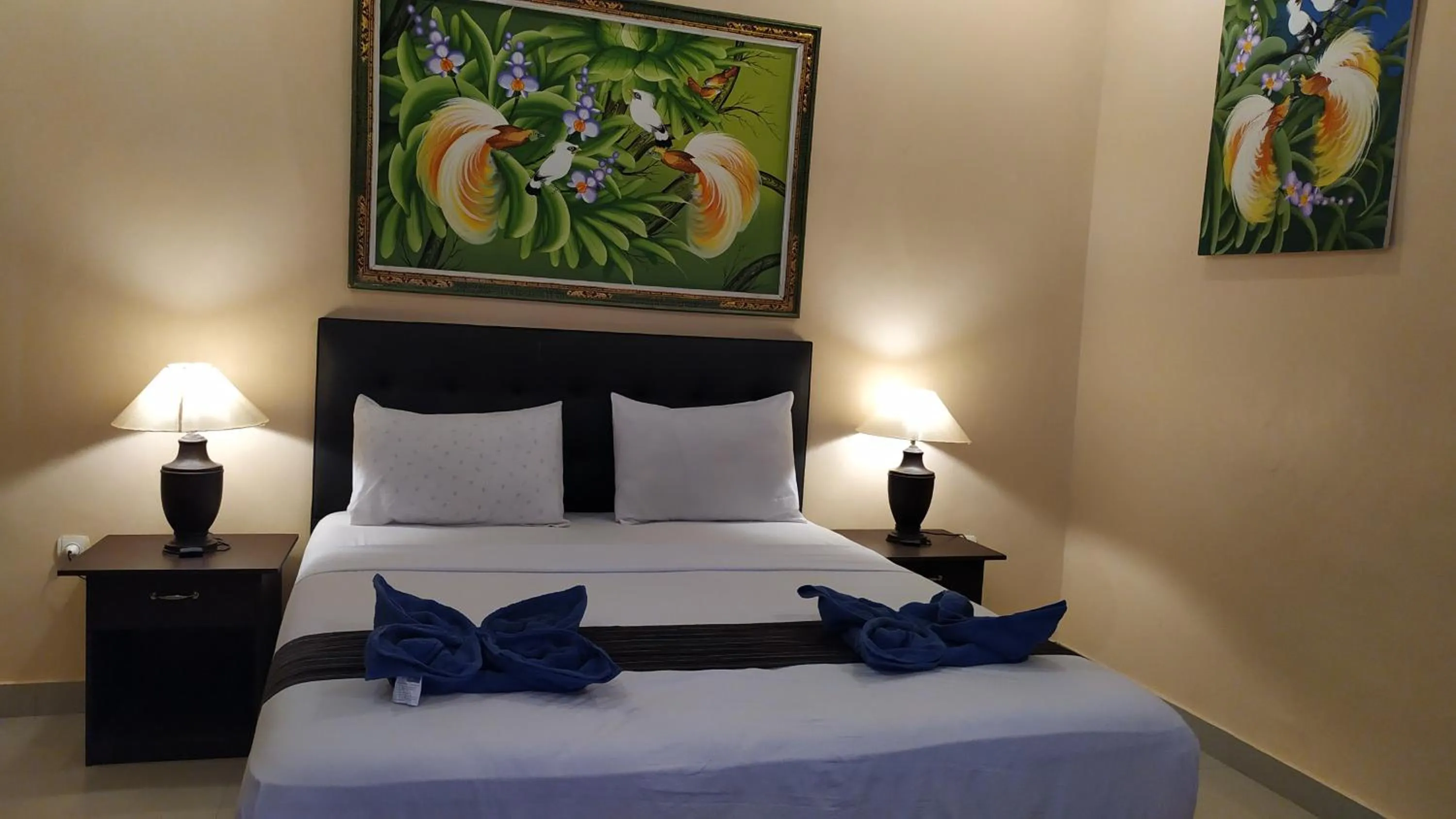 Bed in Kusuka Bungalow