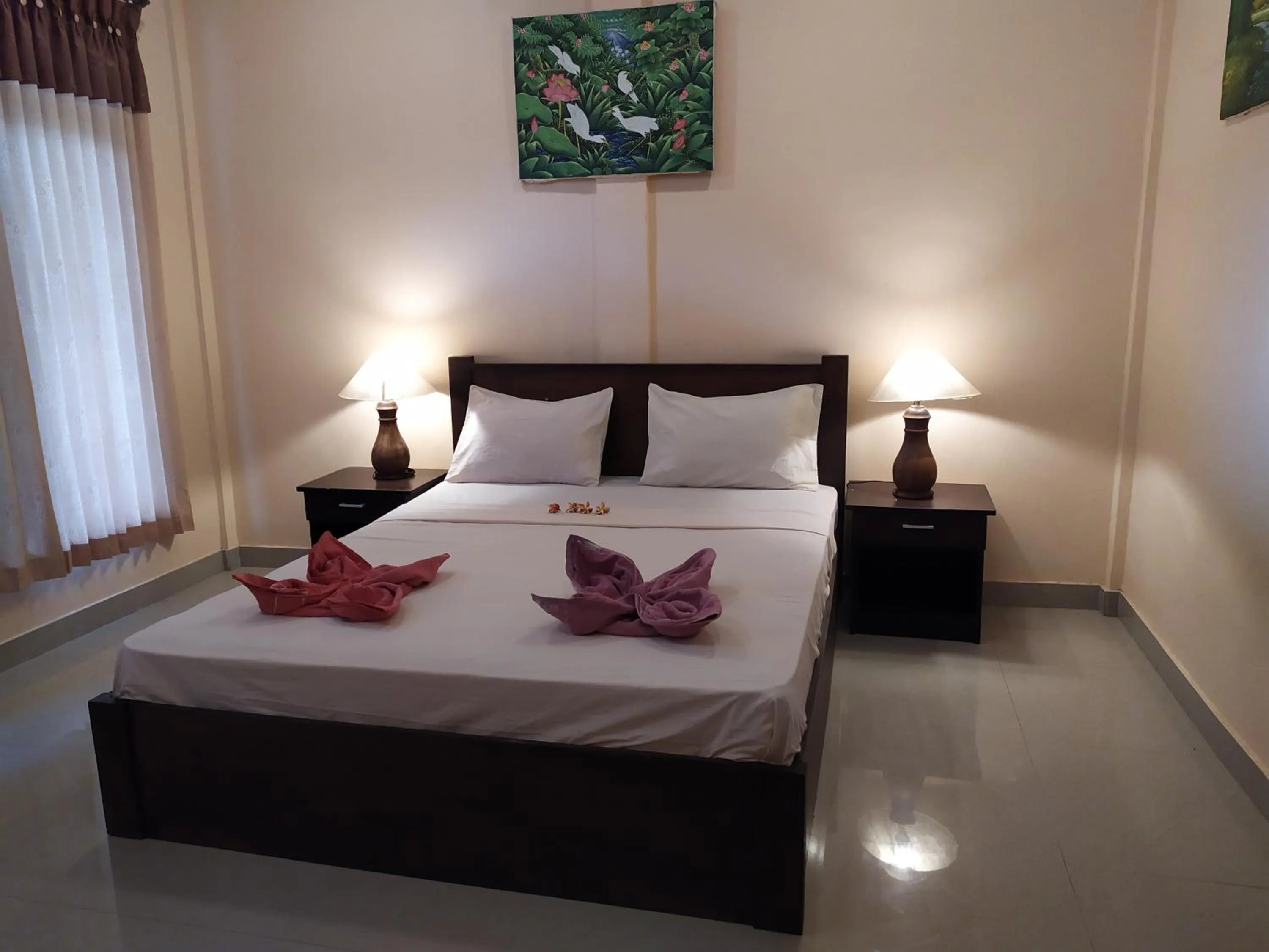 Bed in Kusuka Bungalow