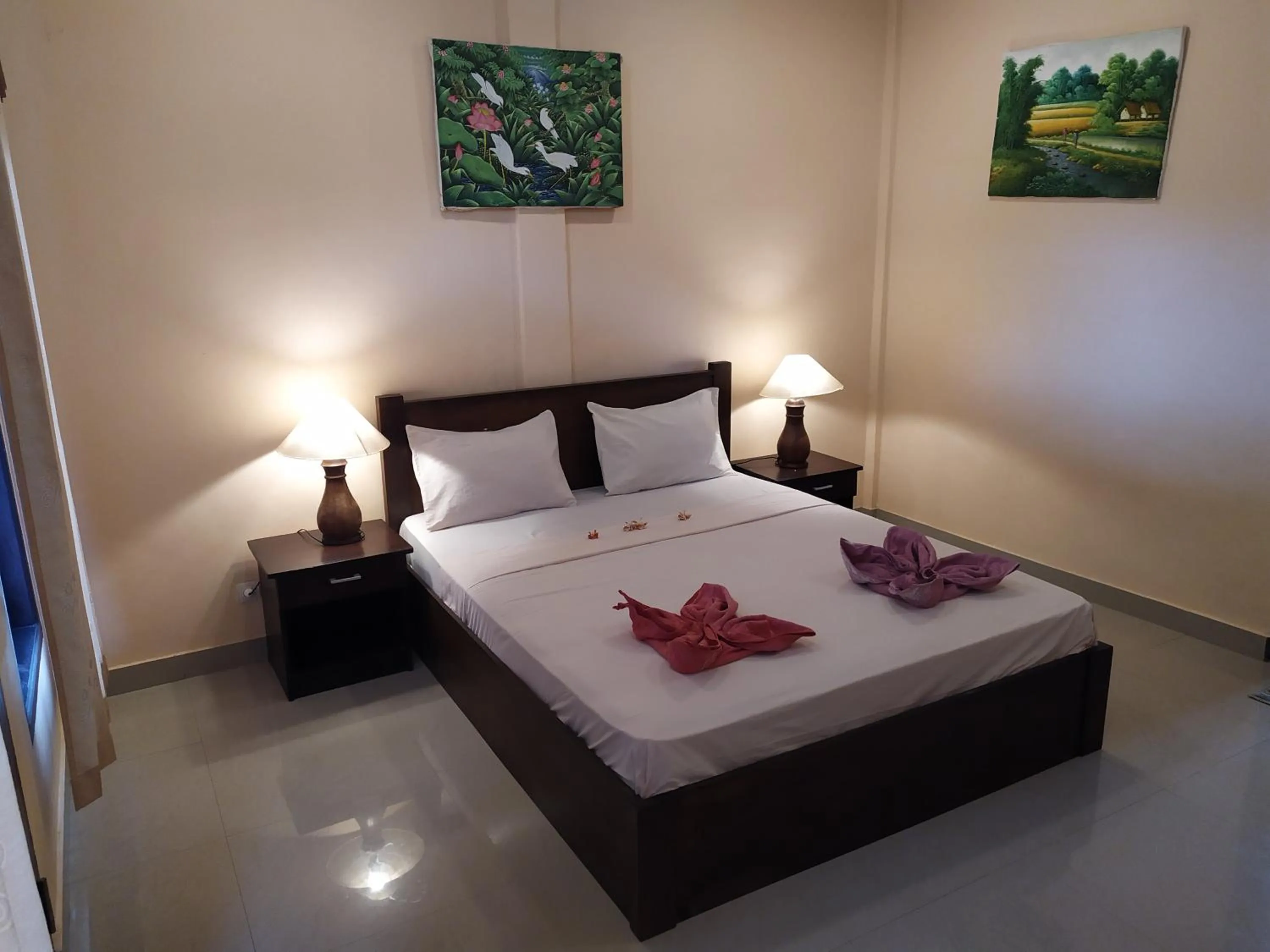 Bed in Kusuka Bungalow