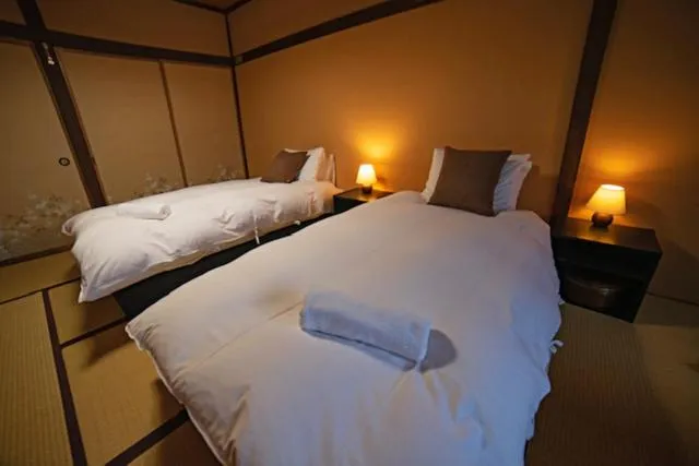 Bed in HA-MON Slope Side Hotel and Private Chalet