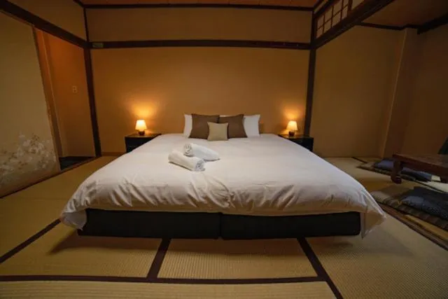 Bed in HA-MON Slope Side Hotel and Private Chalet