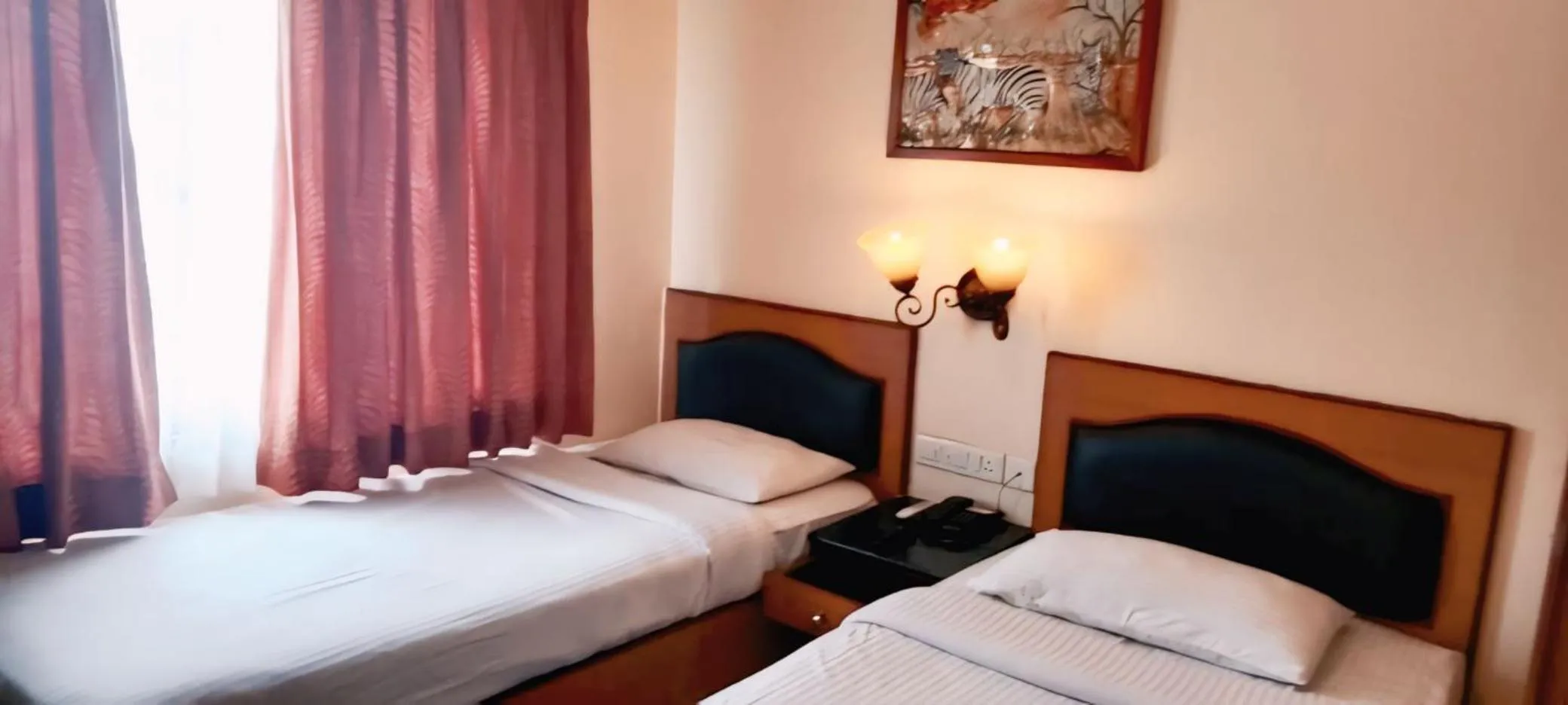 Bed in Hotel Nahar Manchester Inn