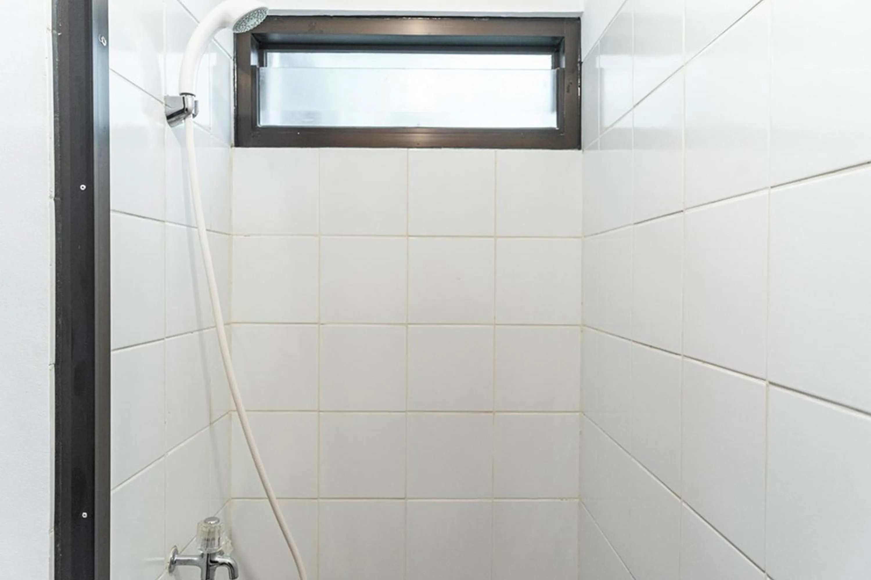 Bathroom in RedDoorz Plus @ EcoHome Citra Raya Tangerang