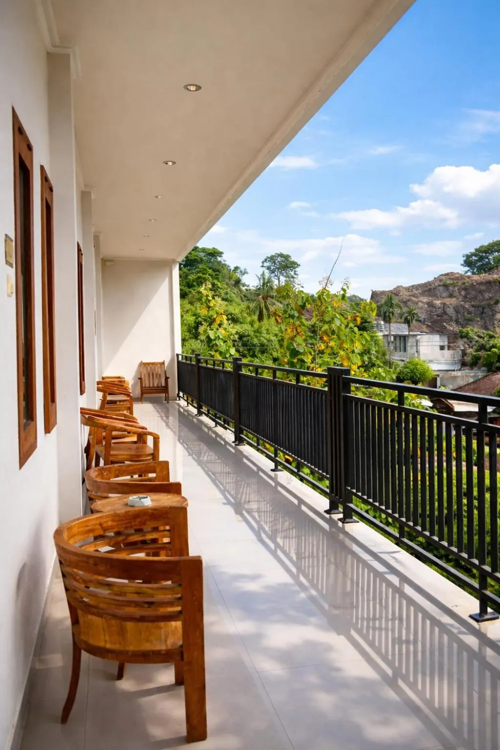 Balcony/Terrace in Grand Kuta Hotel Lombok - Pool - 43 inch Google TV - Strong 60Mbps WiFi - New Enhanced Management