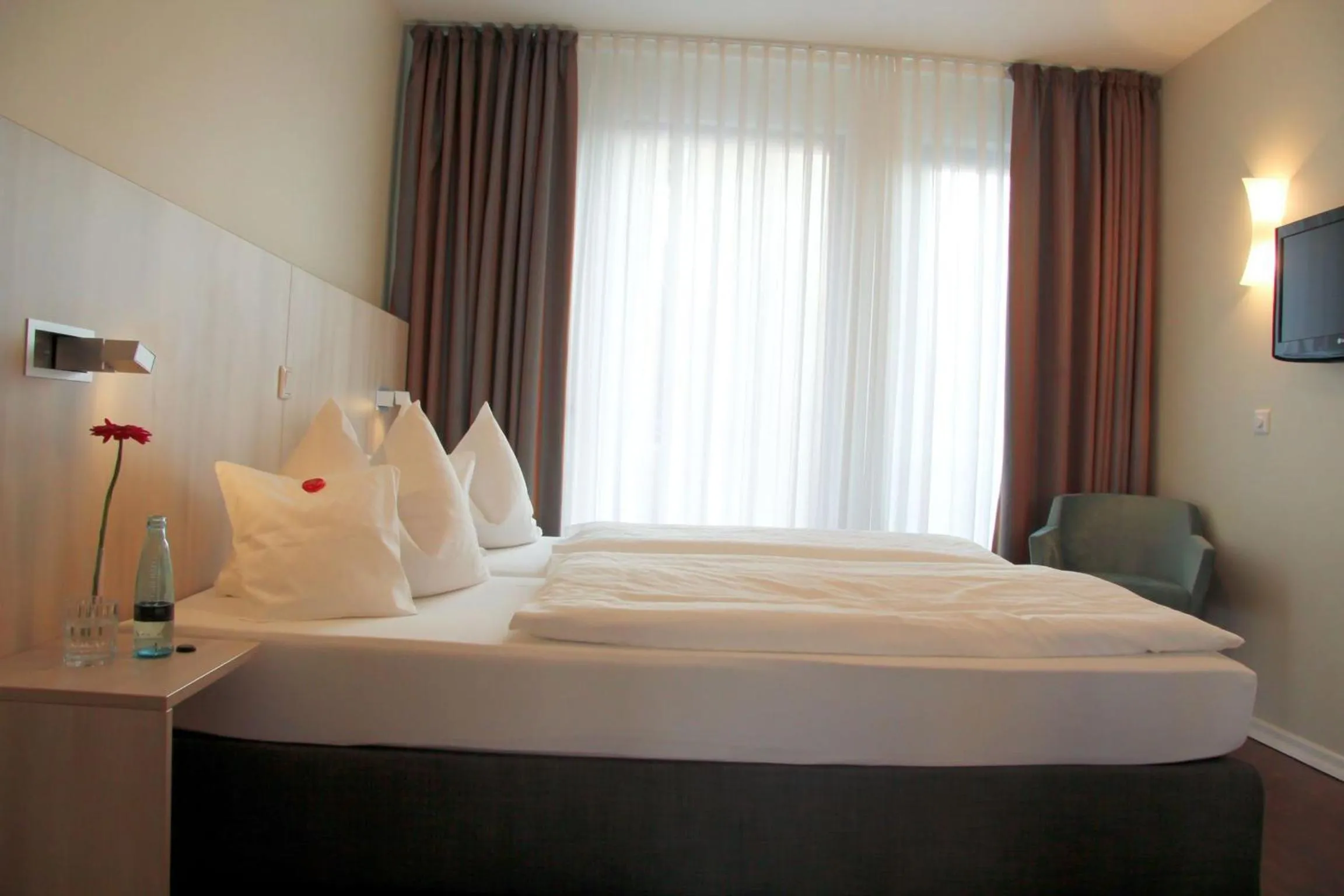 Bed in Stadthaushotel Hamburg - Inklusionshotel