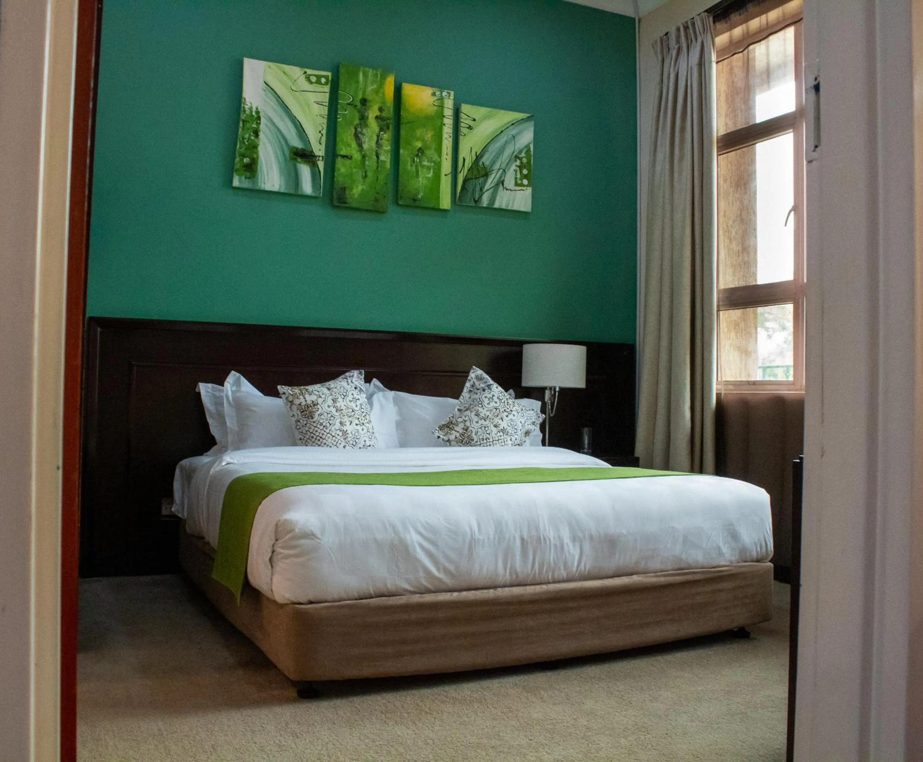 Bed in MalVille Boutique Hotel