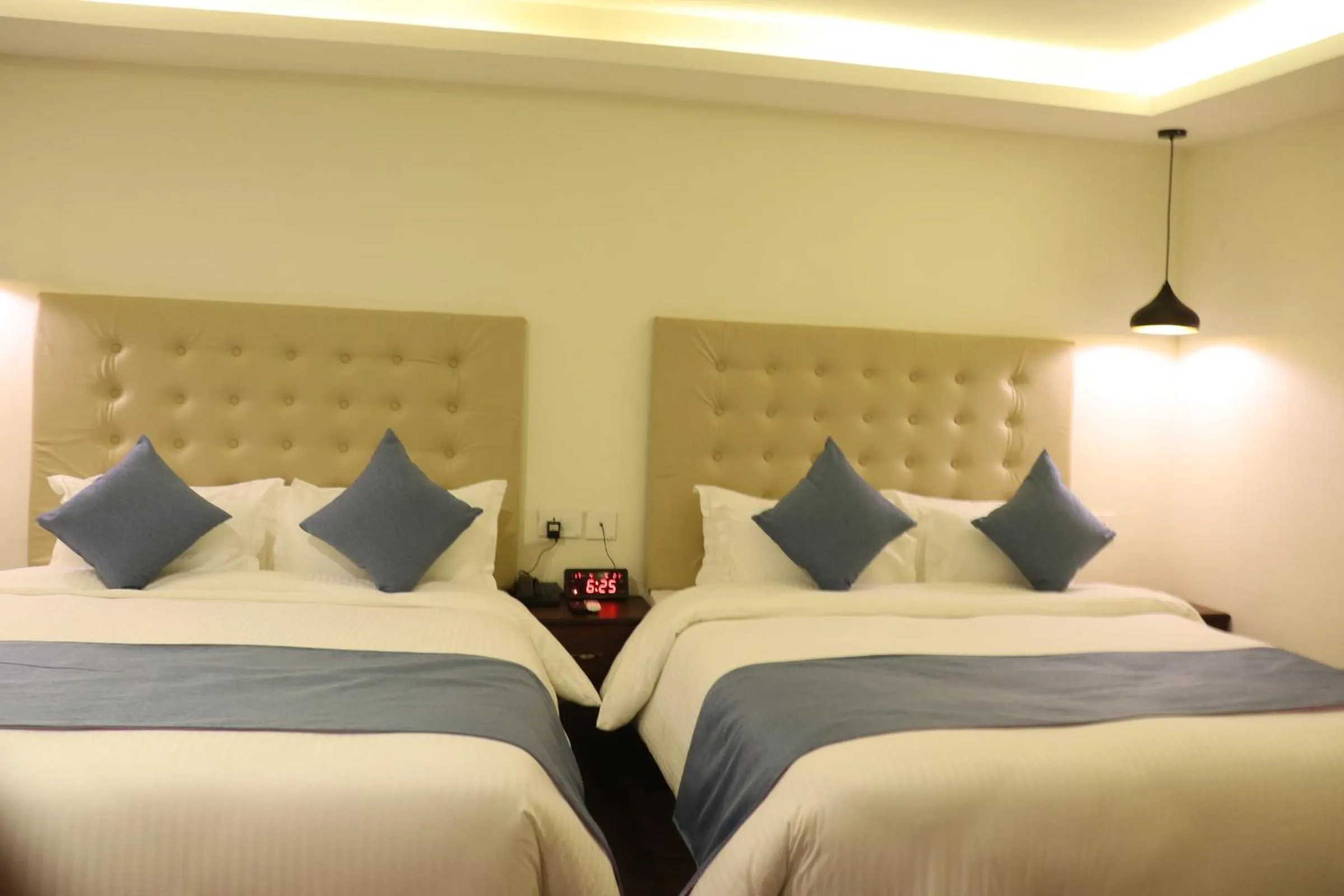 Bed in Satkar Hotel and Spa