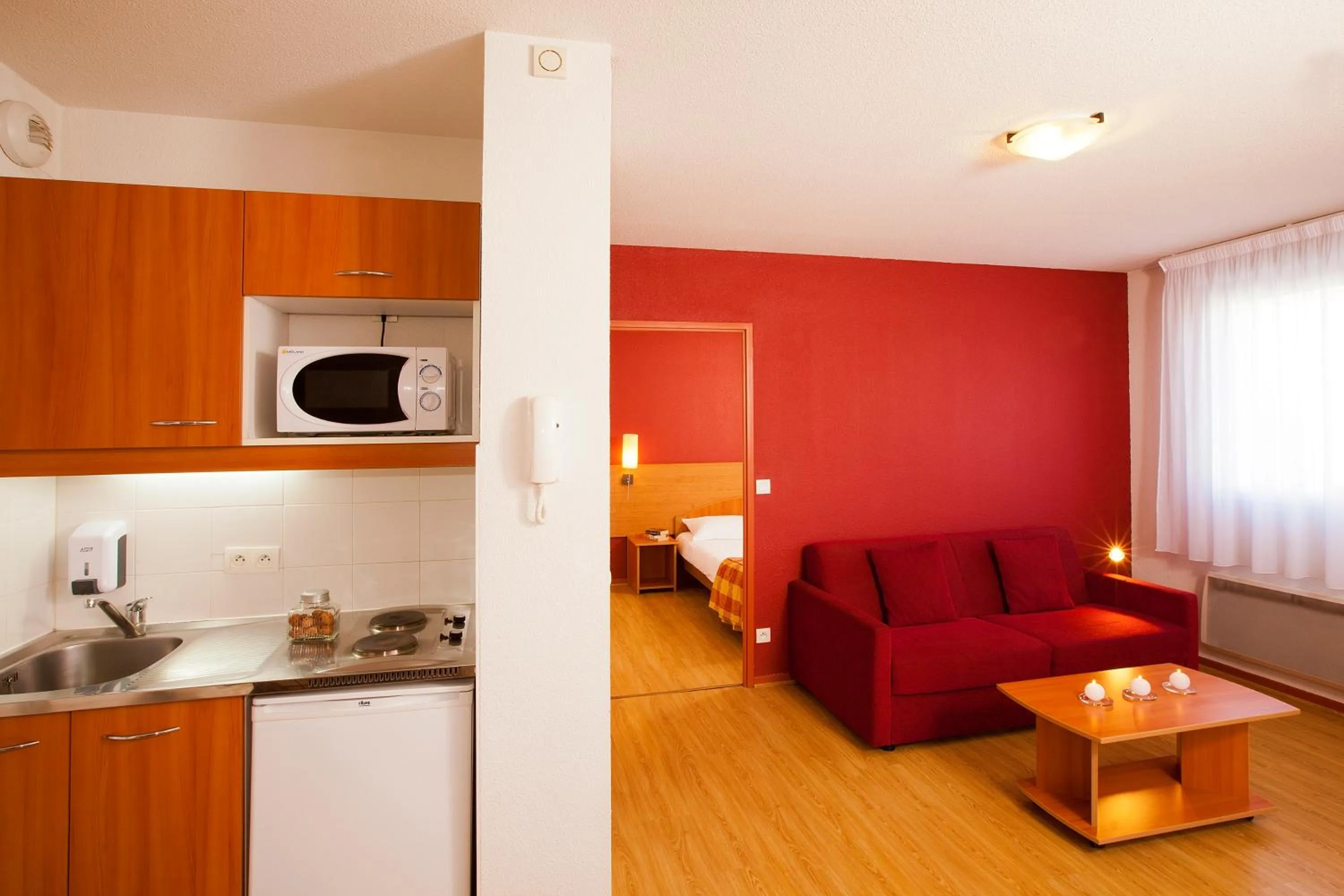 Kitchen or kitchenette in Séjours & Affaires Genève Saint Genis