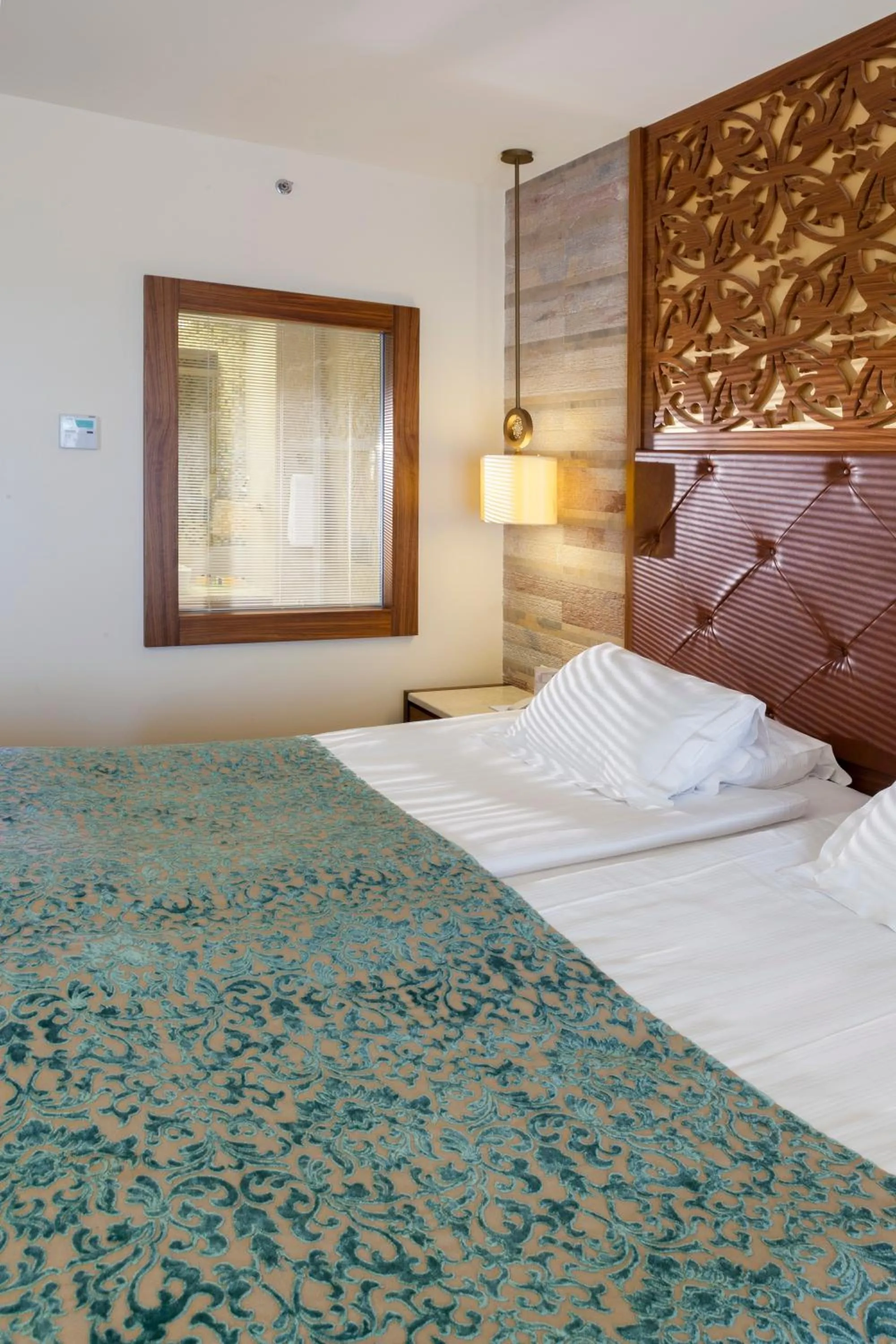 Bed in Melas Lara Hotel