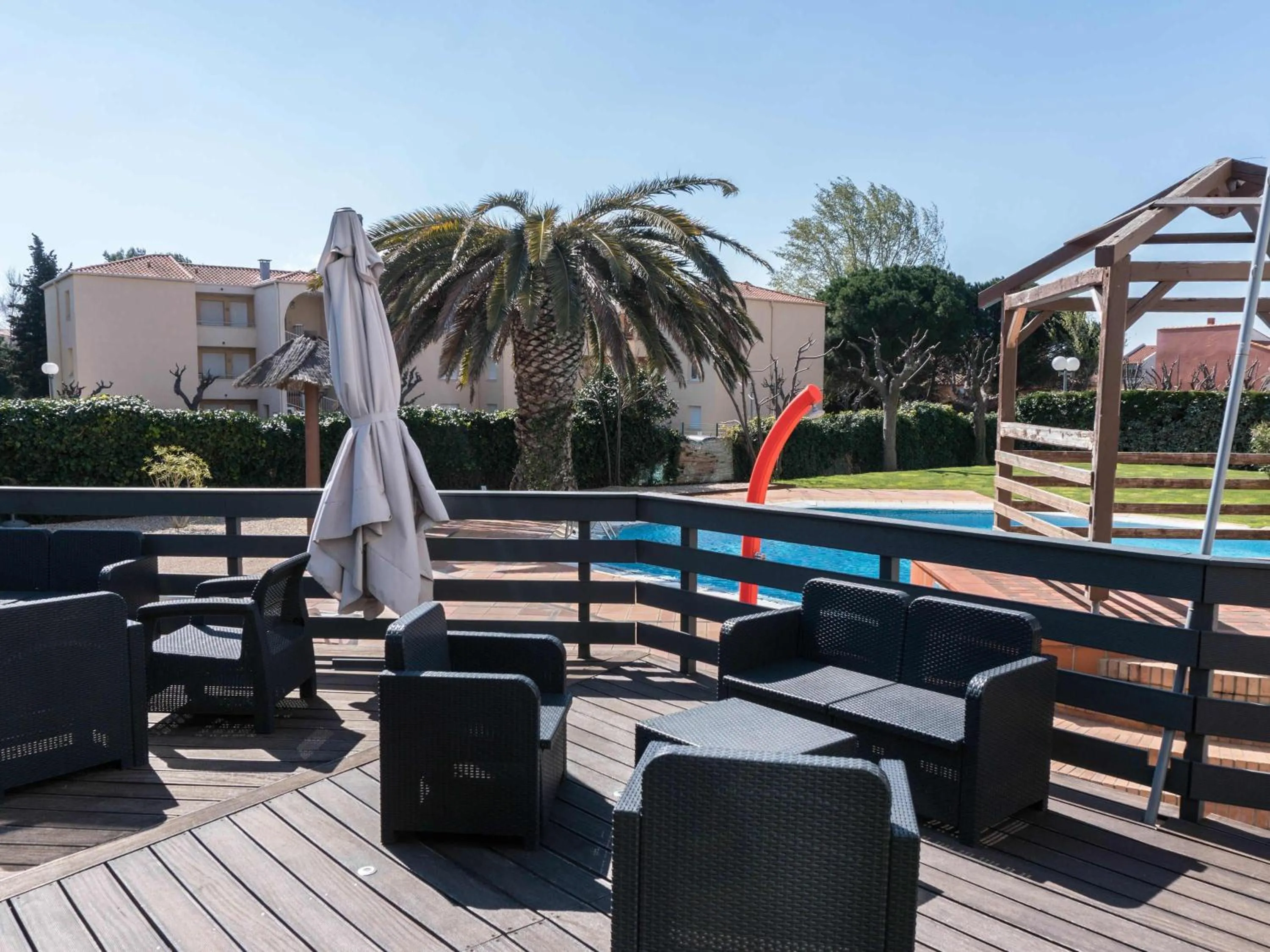 Pool view in ibis Styles Perpignan Canet En Roussillon