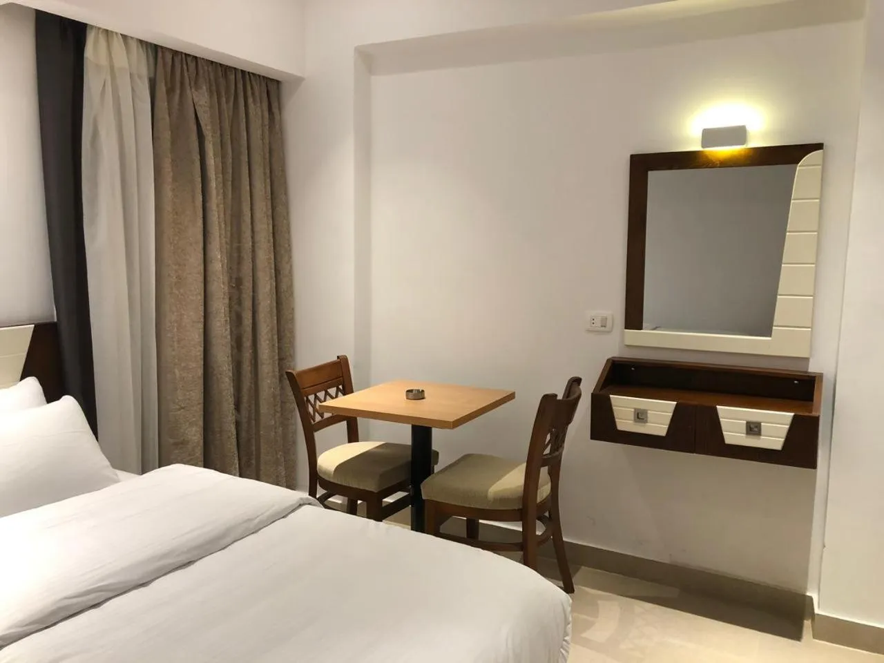 TV and multimedia, Bed in Maxim Hotel