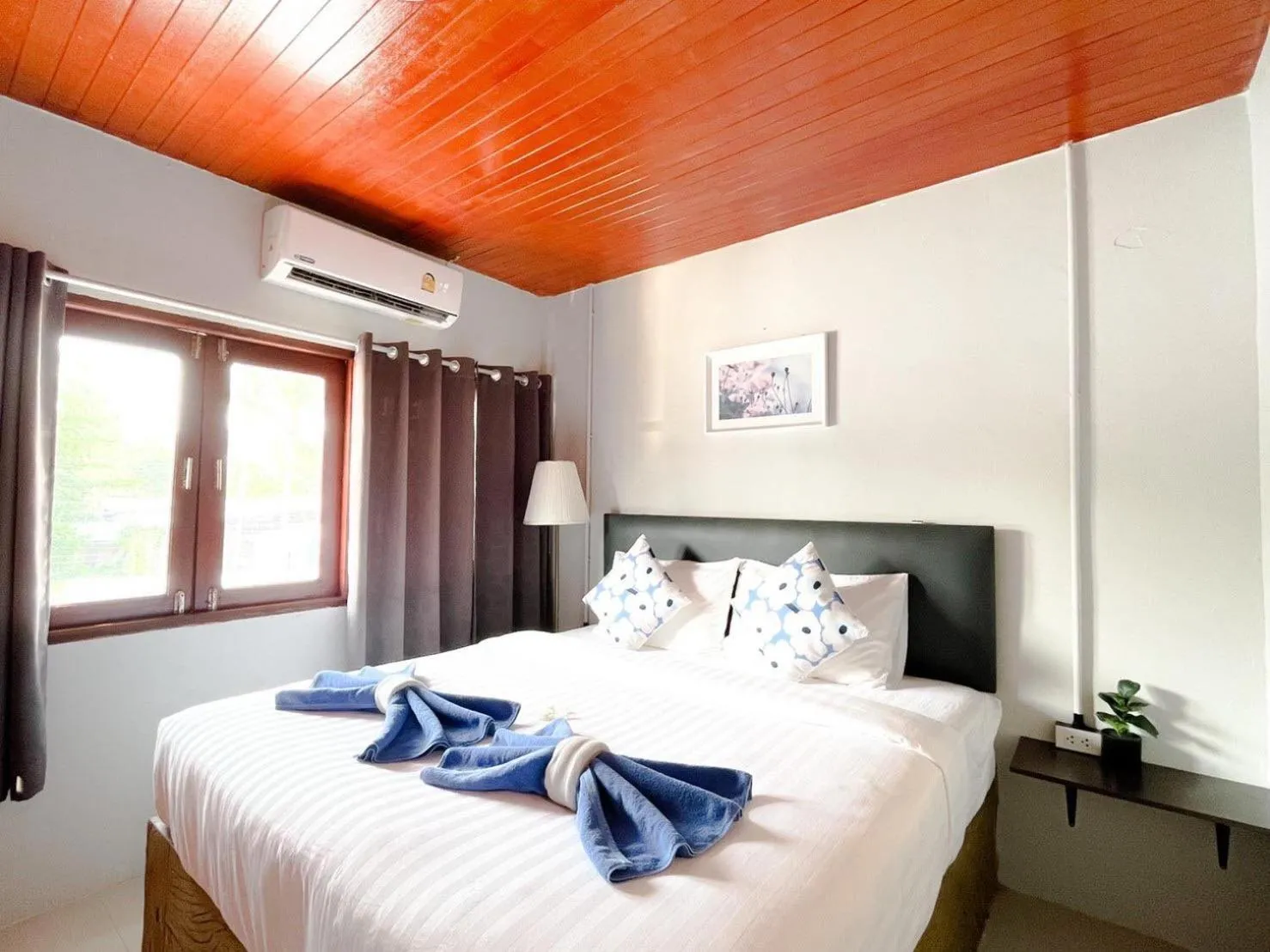 Photo of the whole room, Bed in MOOK BOONCHU HOTEL