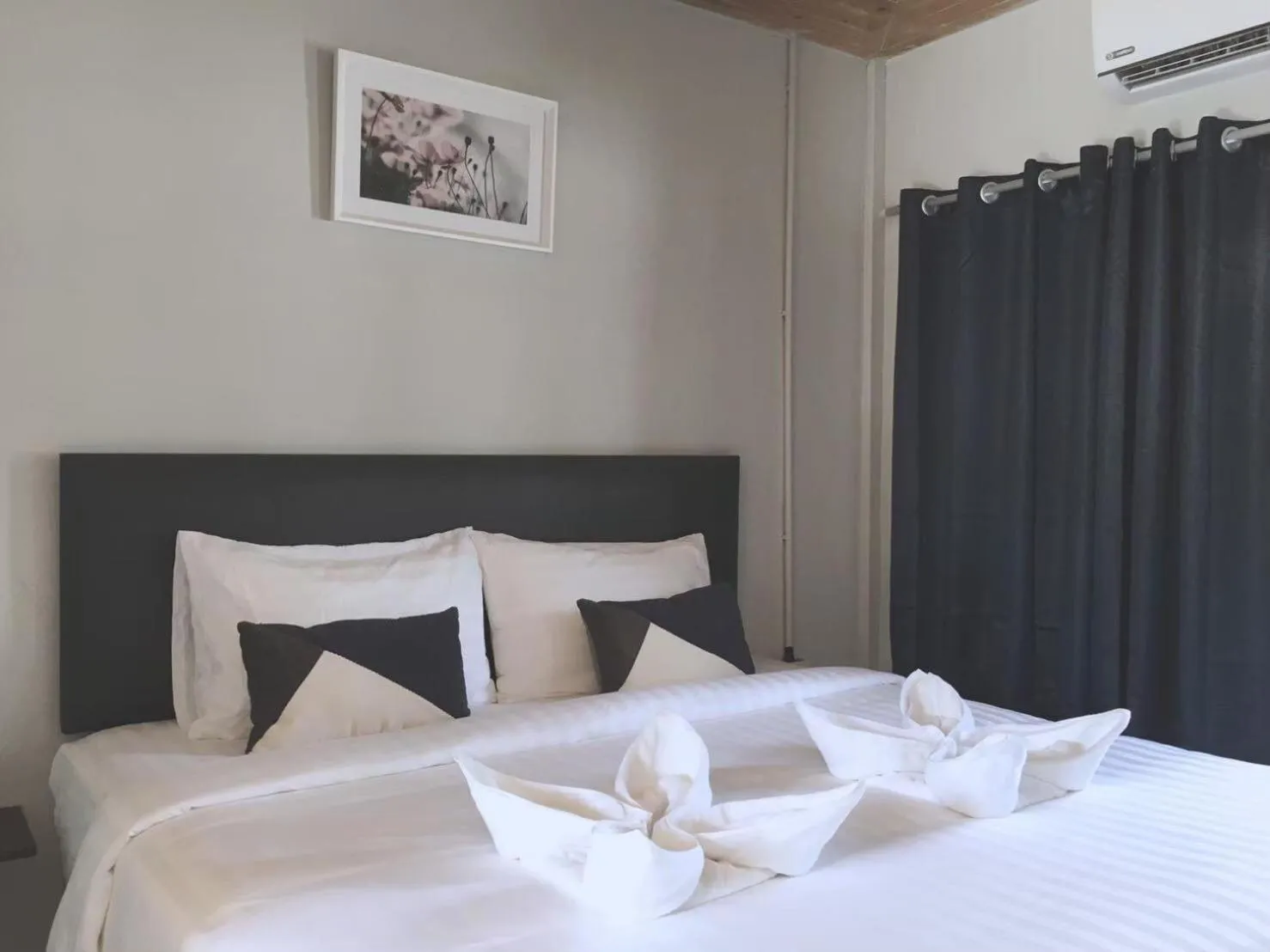 Photo of the whole room, Bed in MOOK BOONCHU HOTEL