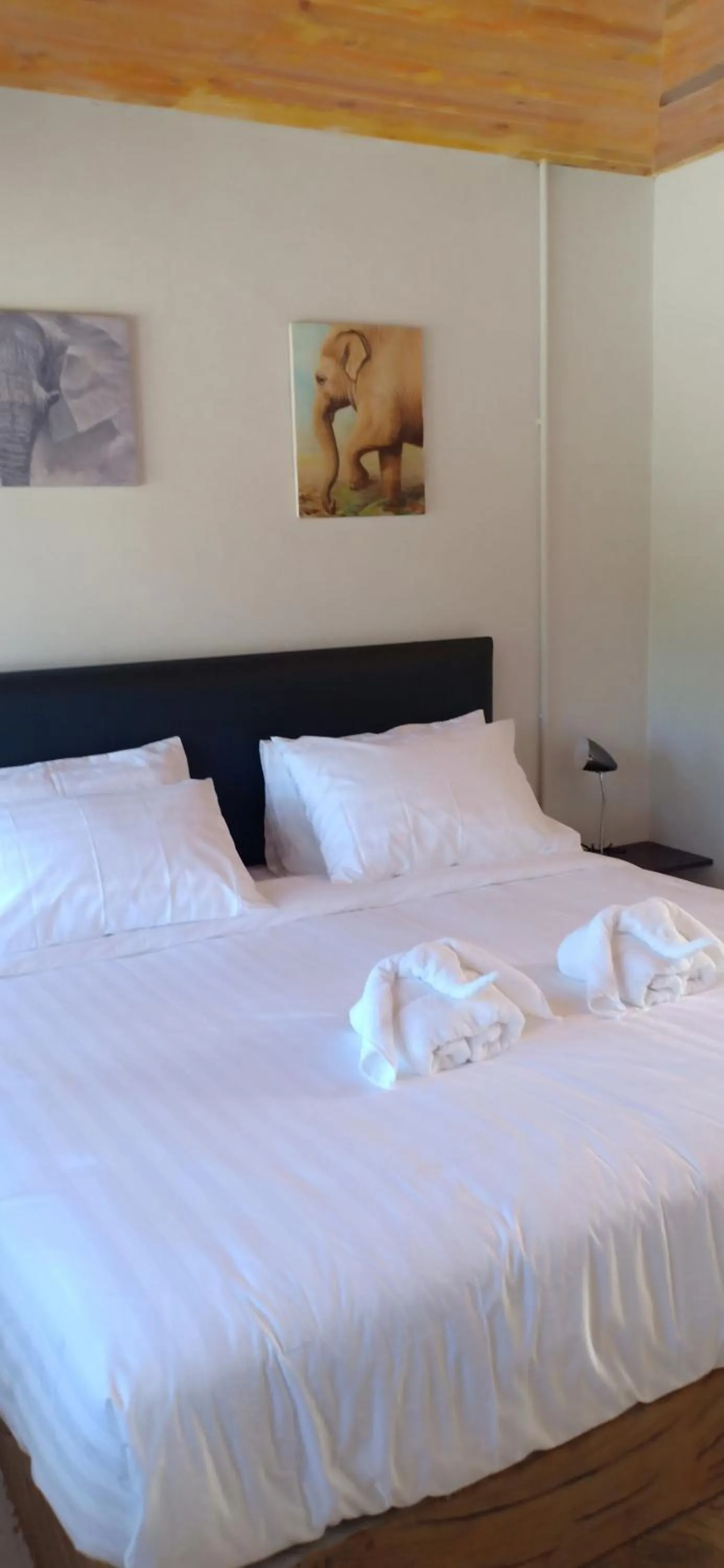 Bed in MOOK BOONCHU HOTEL