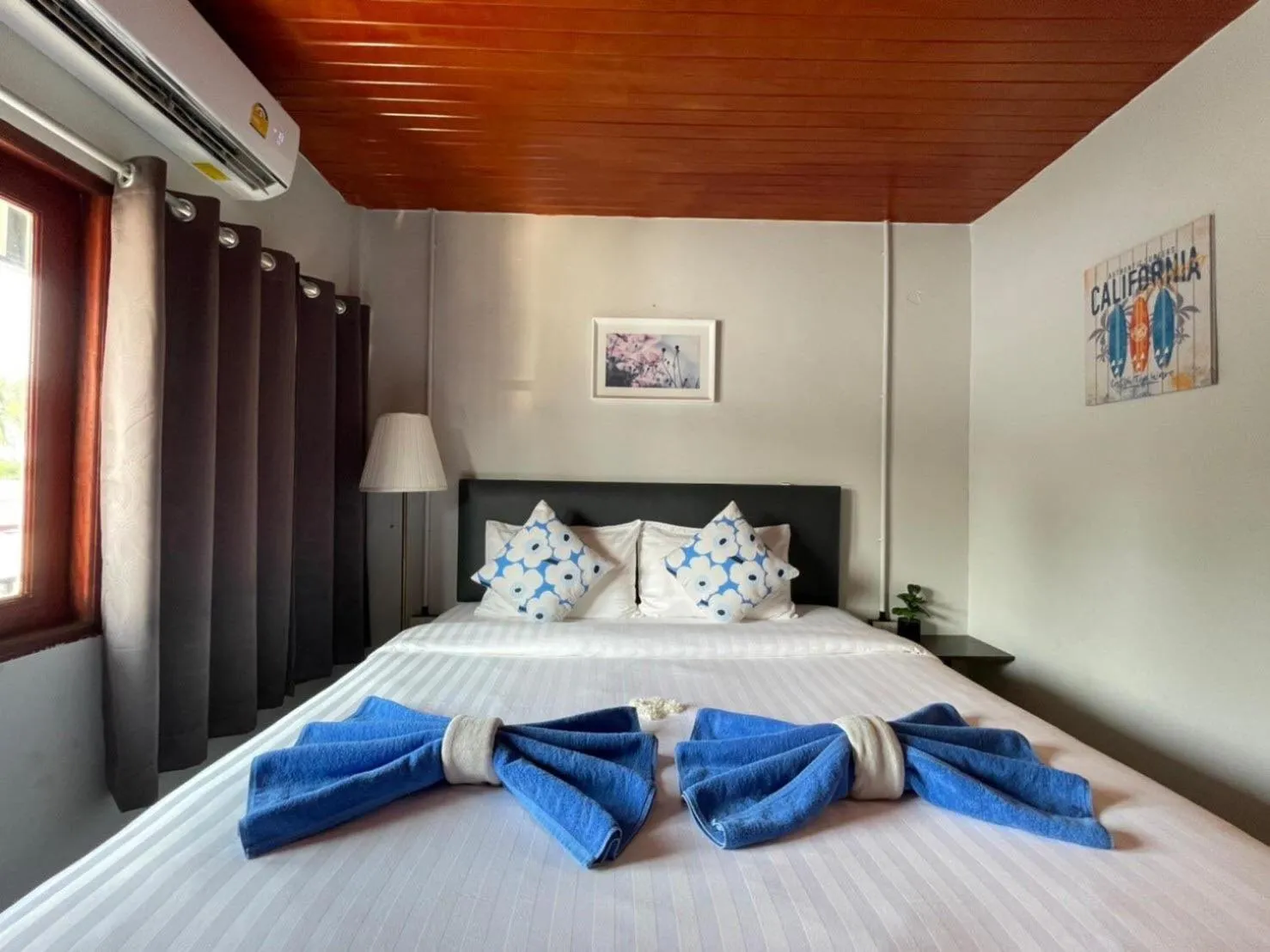 Photo of the whole room, Bed in MOOK BOONCHU HOTEL