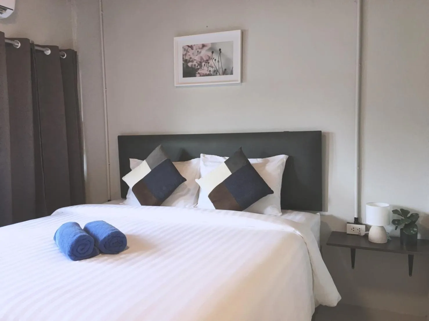 Photo of the whole room, Bed in MOOK BOONCHU HOTEL