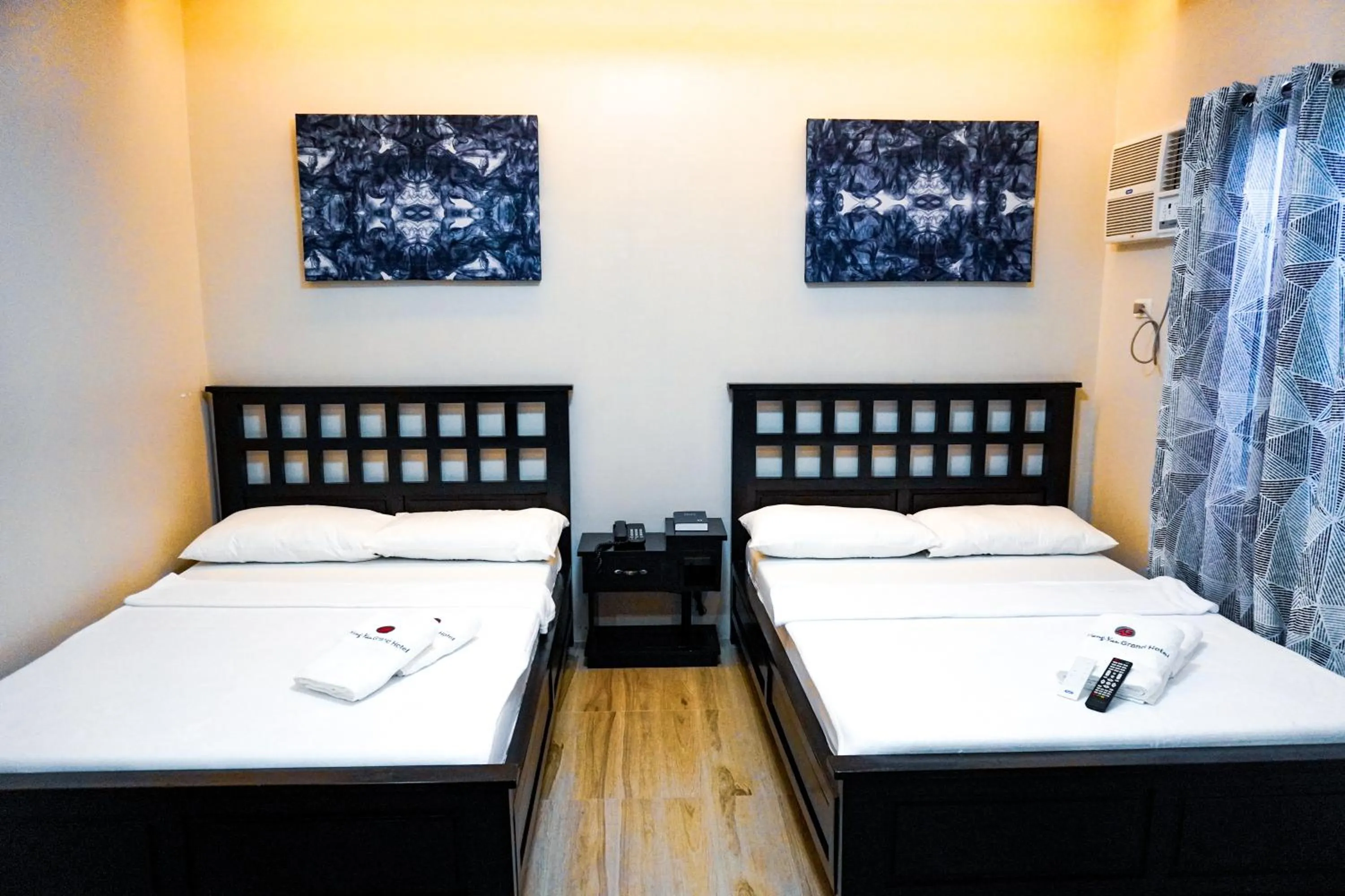 Bed in The Mang-Yan Grand Hotel powered by Cocotel