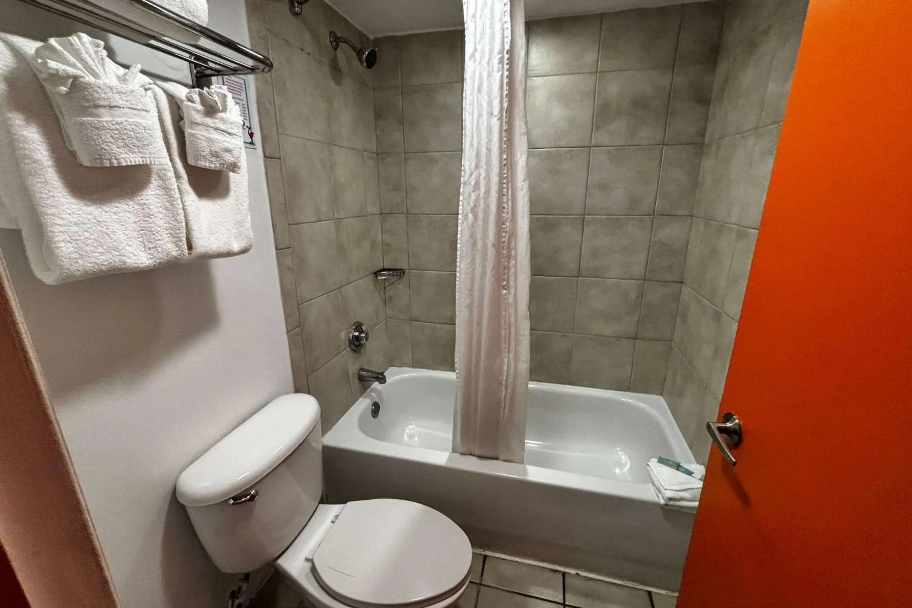 Bathroom in Ramada by Wyndham Flamingo Water Park