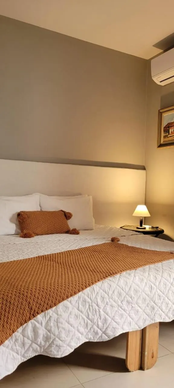 Bed in POUSADA DA NANA