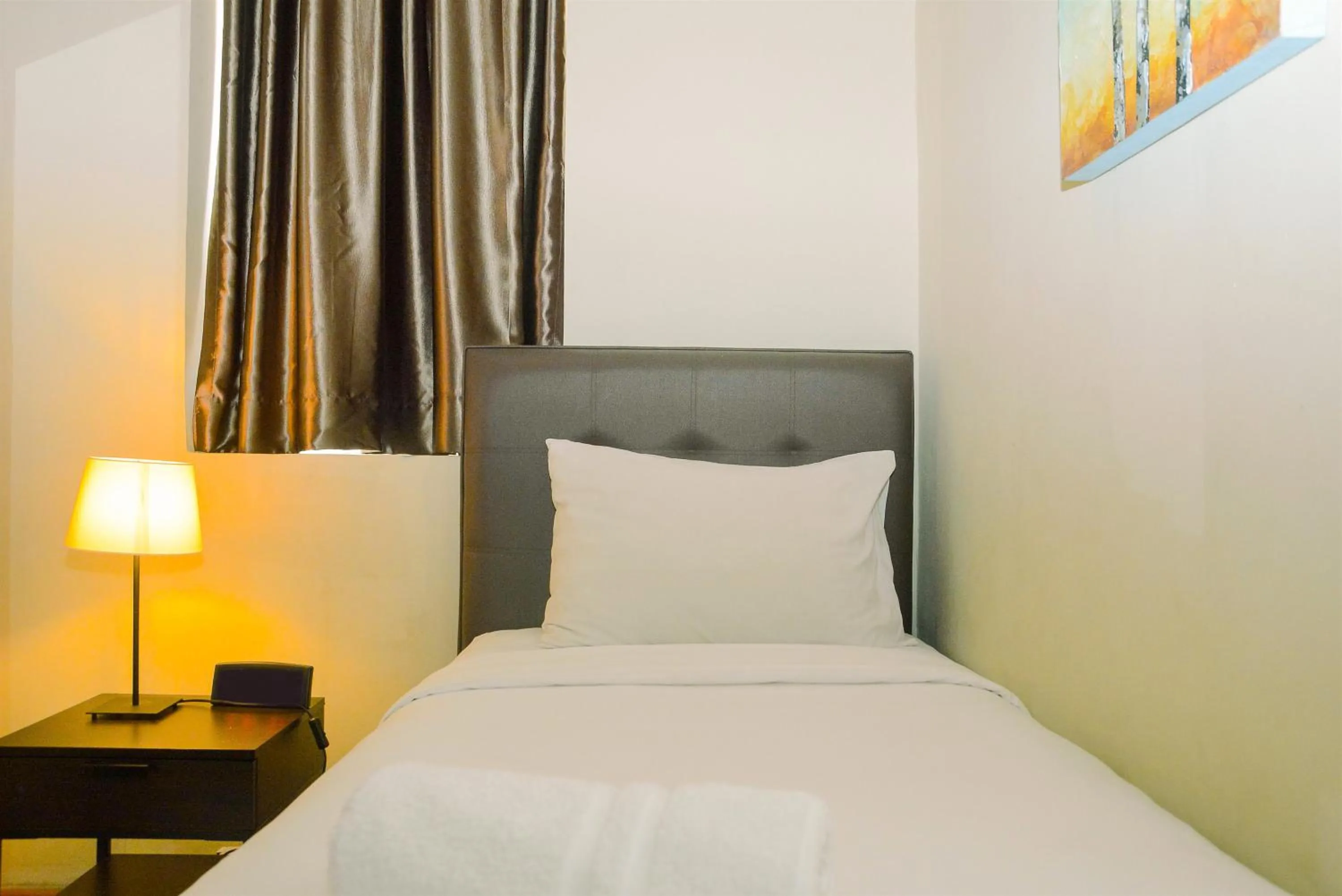 Bedroom, Bed in 3BR Business Residence at Grand Palace Kemayoran Apartment By Travelio