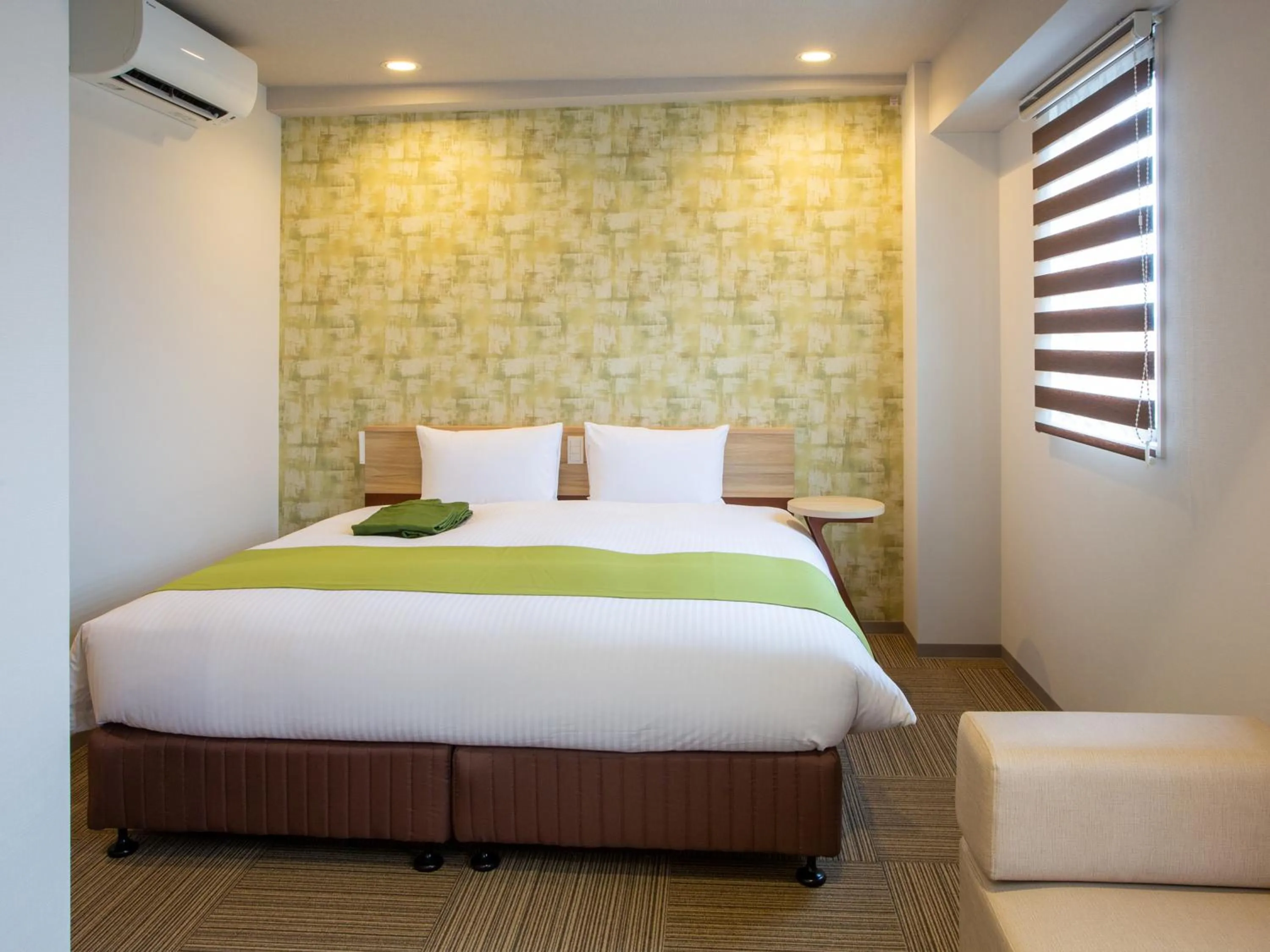 Bed in Kuretake Inn Ogaki Ekimae