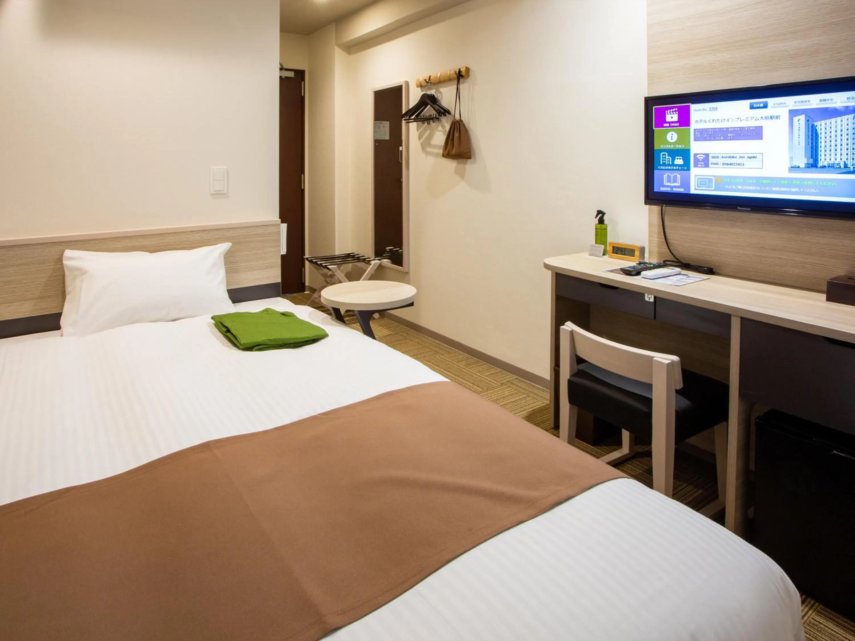 Bed in Kuretake Inn Ogaki Ekimae